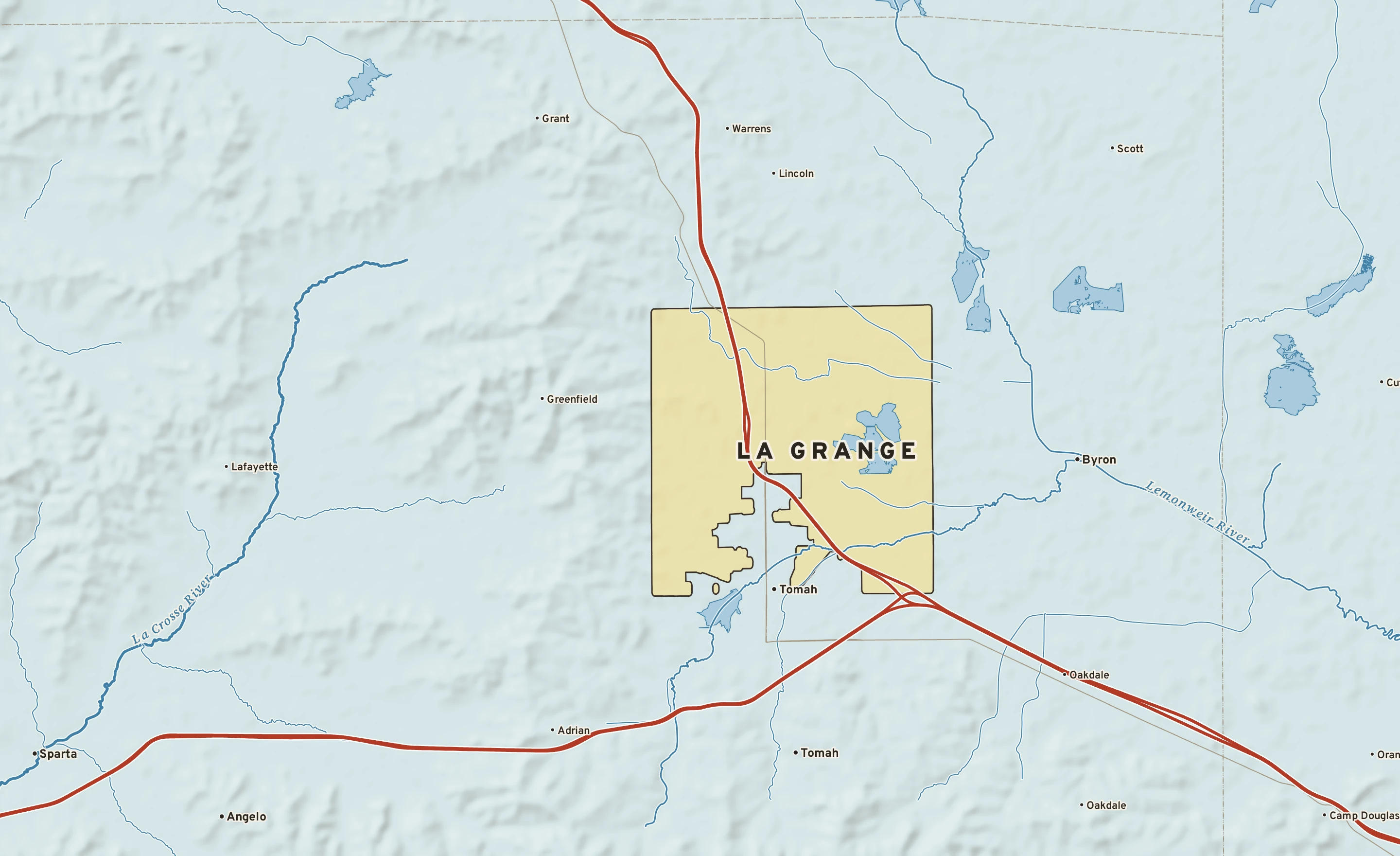 Shaded-relief atlas plate of La Grange, Wisconsin: rivers, roads, the city limits and where the water drains.