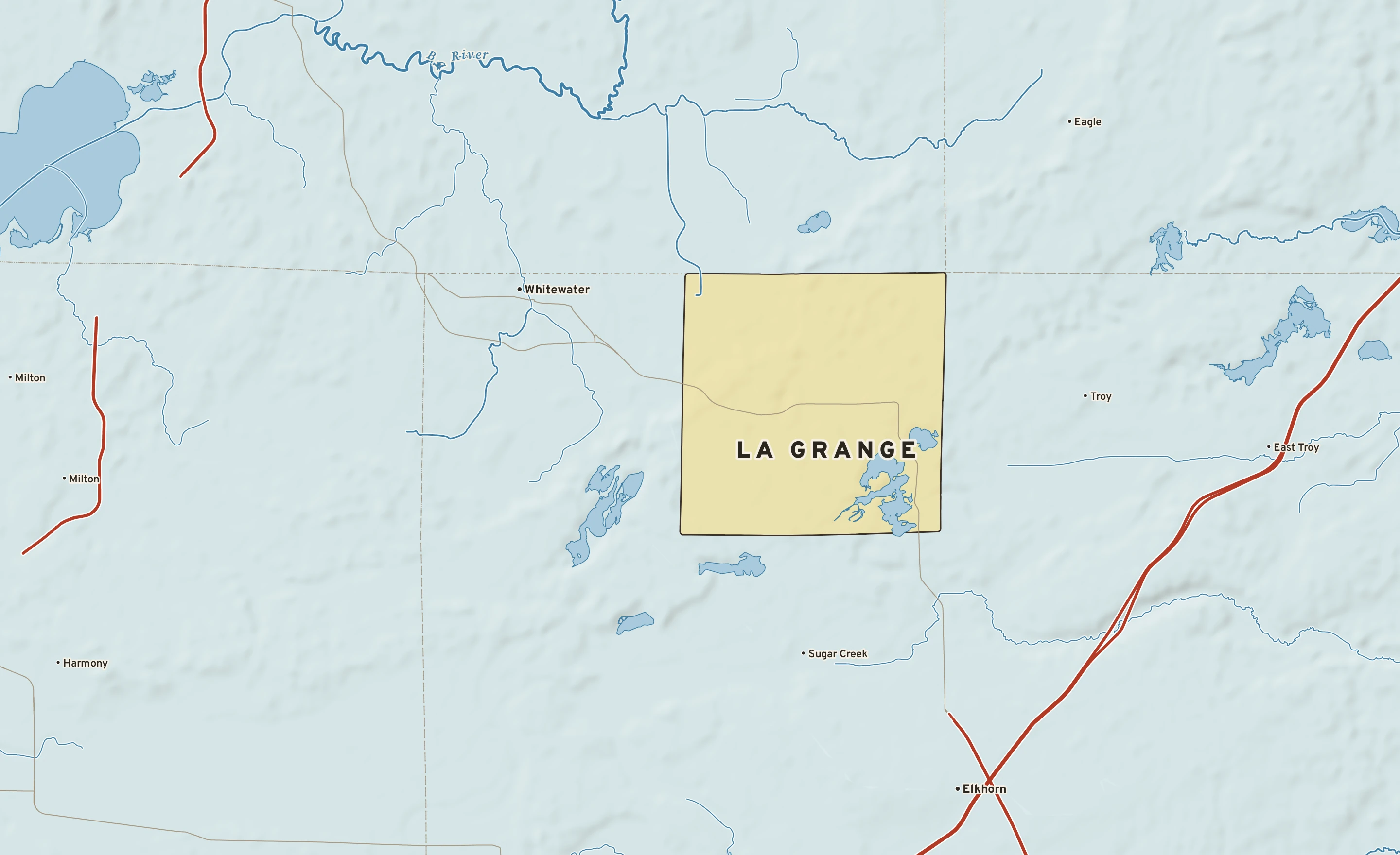 Shaded-relief atlas plate of La Grange, Wisconsin: rivers, roads, the city limits and where the water drains.