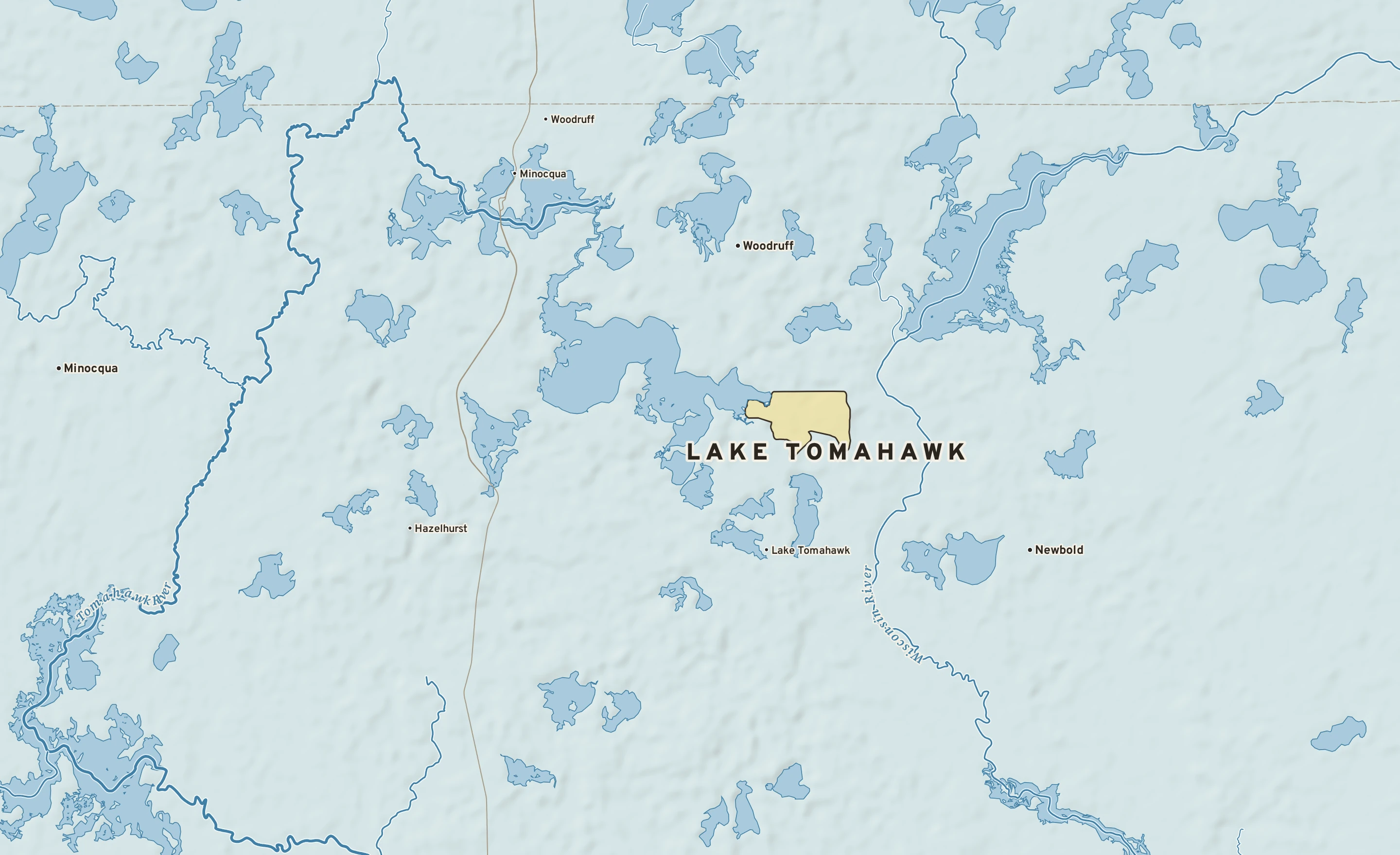 Shaded-relief atlas plate of Lake Tomahawk, Wisconsin: rivers, roads, the city limits and where the water drains.