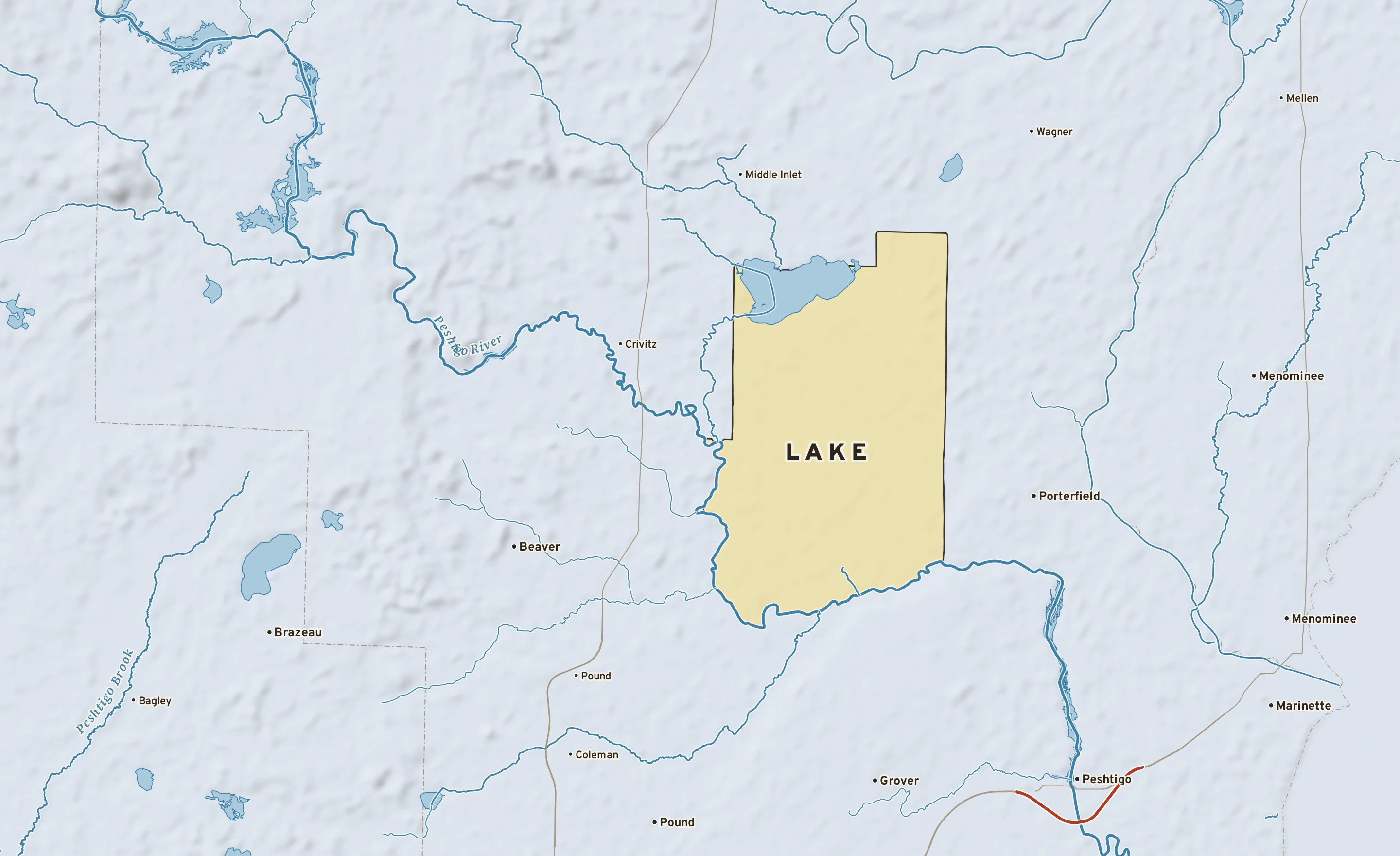 Shaded-relief atlas plate of Lake, Wisconsin: rivers, roads, the city limits and where the water drains.