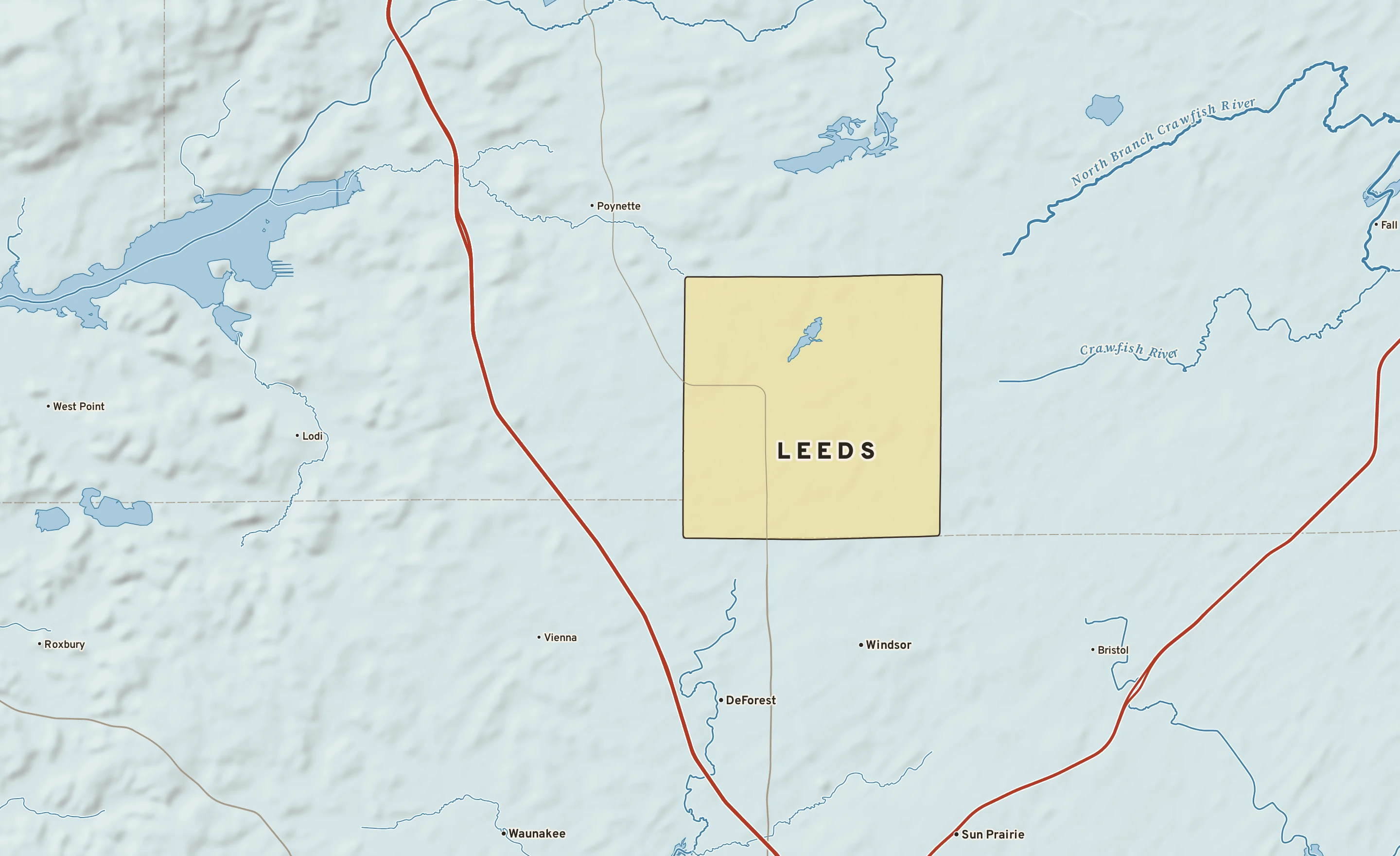 Shaded-relief atlas plate of Leeds, Wisconsin: rivers, roads, the city limits and where the water drains.