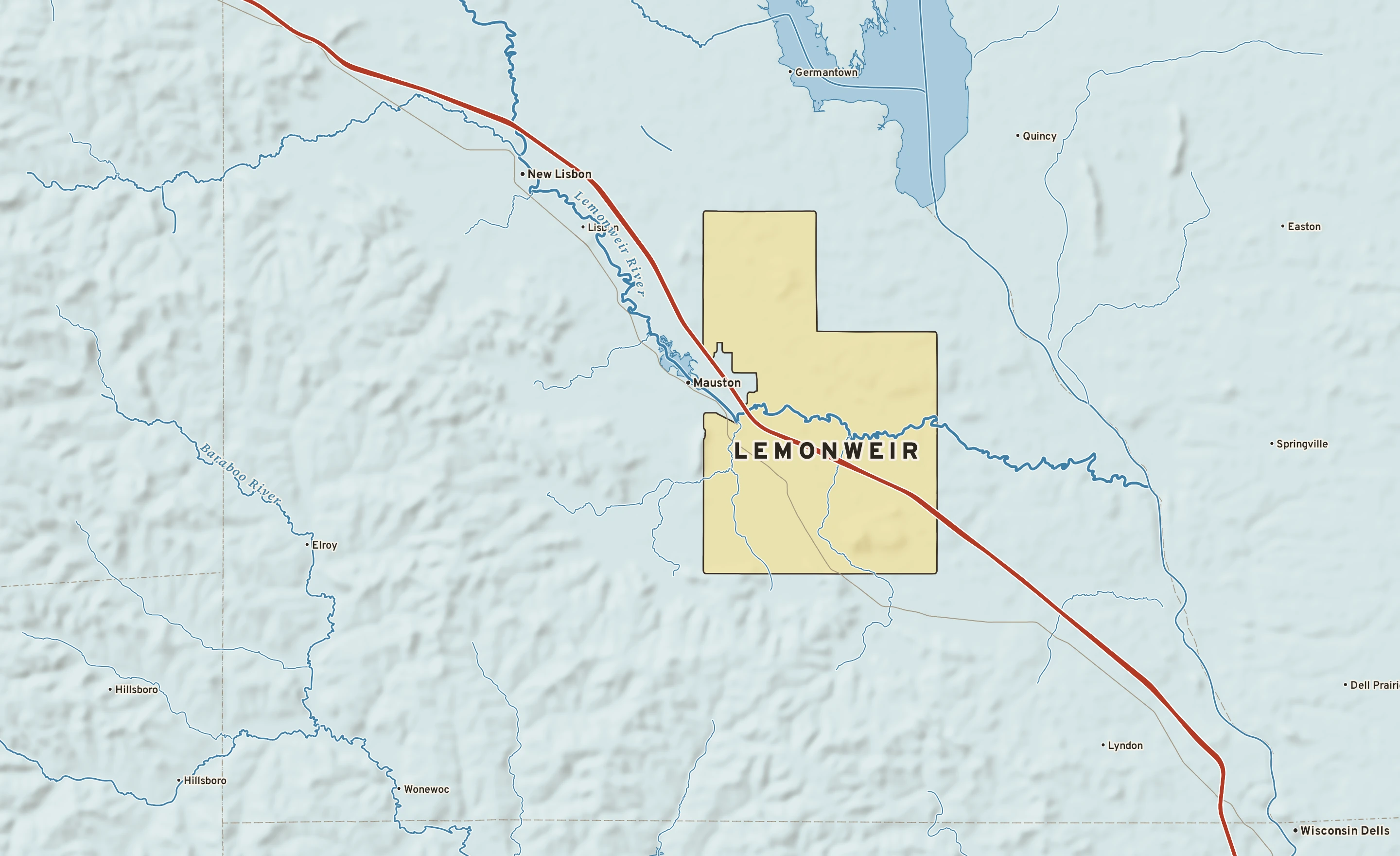 Shaded-relief atlas plate of Lemonweir, Wisconsin: rivers, roads, the city limits and where the water drains.