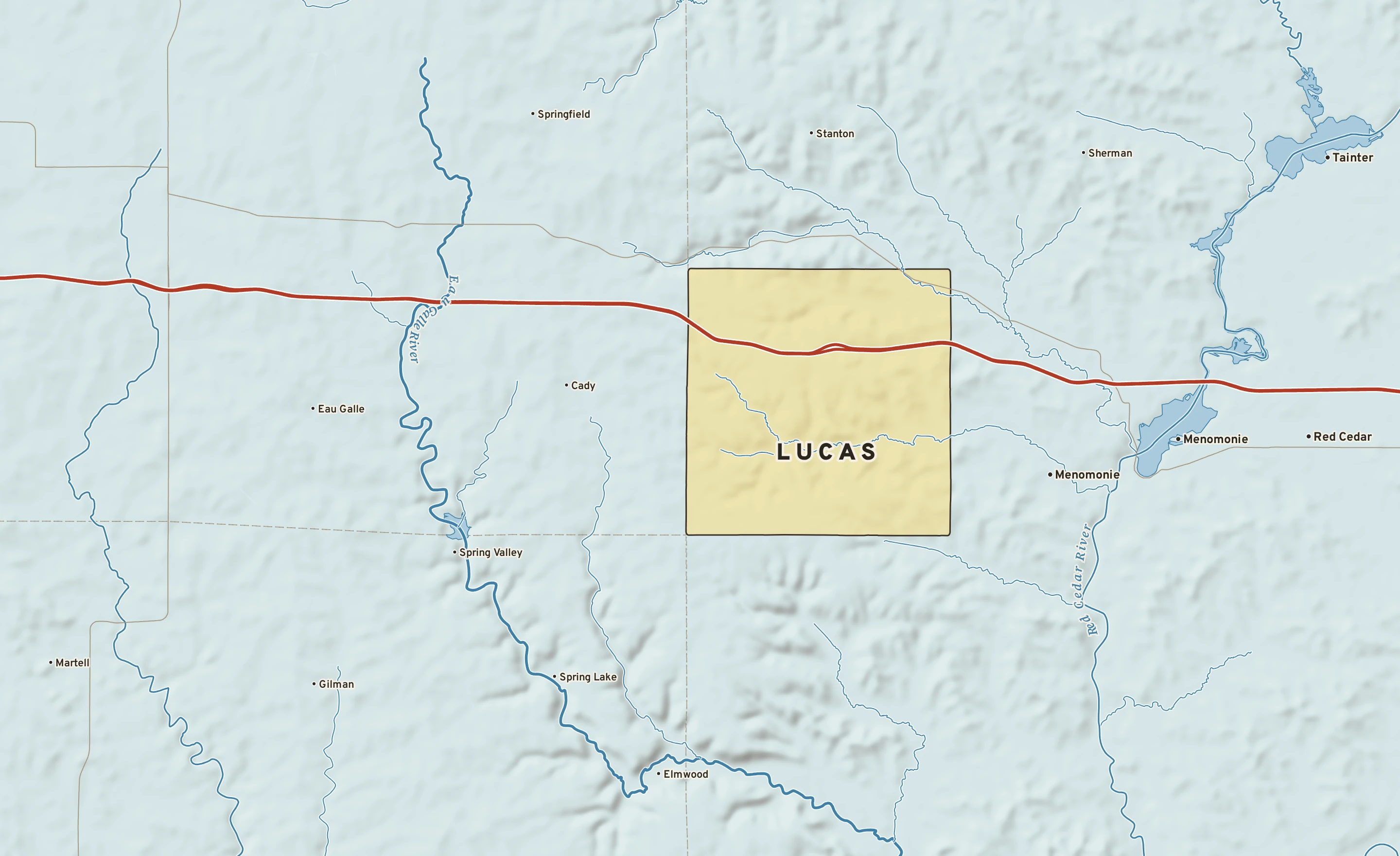 Shaded-relief atlas plate of Lucas, Wisconsin: rivers, roads, the city limits and where the water drains.