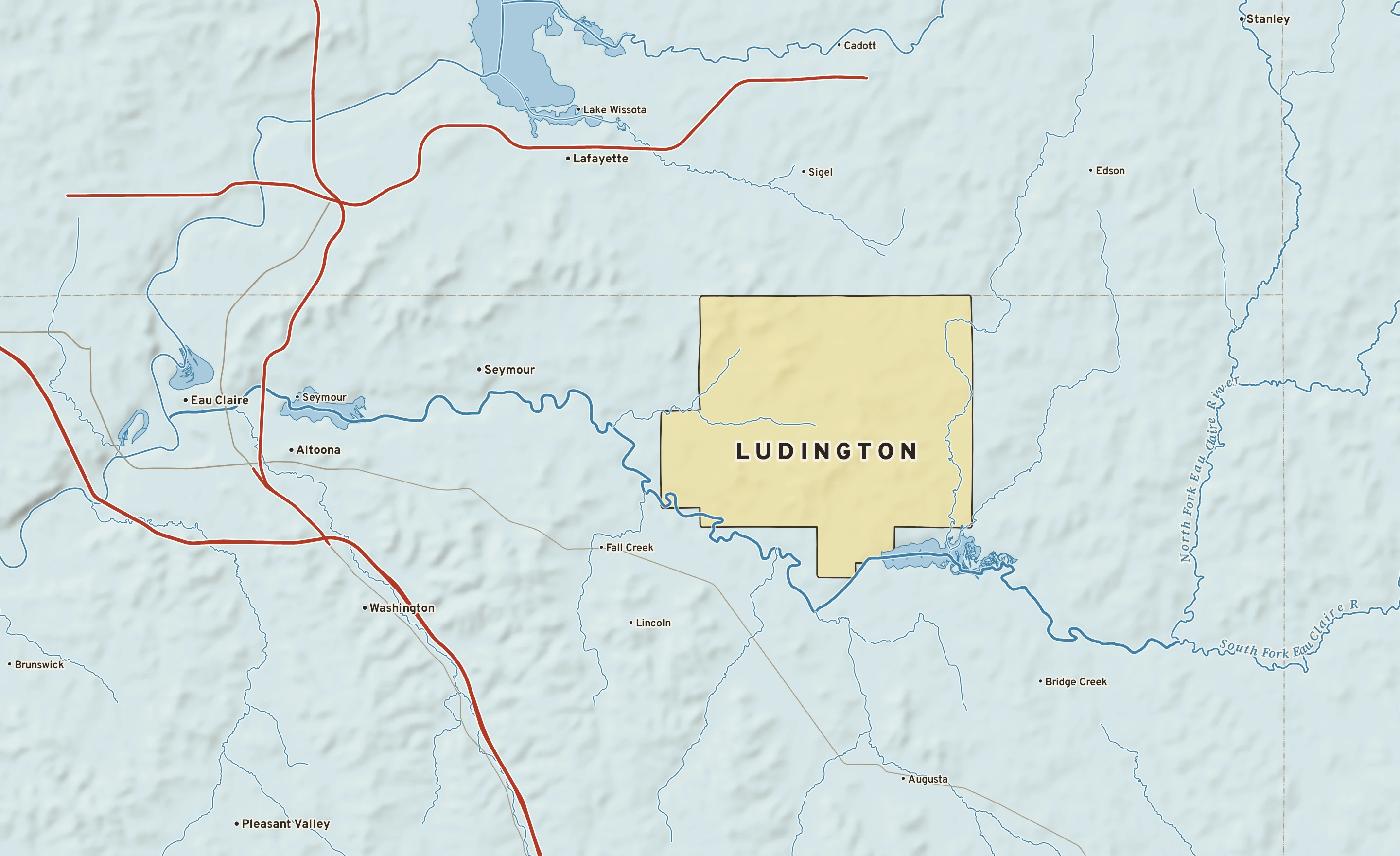 Shaded-relief atlas plate of Ludington, Wisconsin: rivers, roads, the city limits and where the water drains.