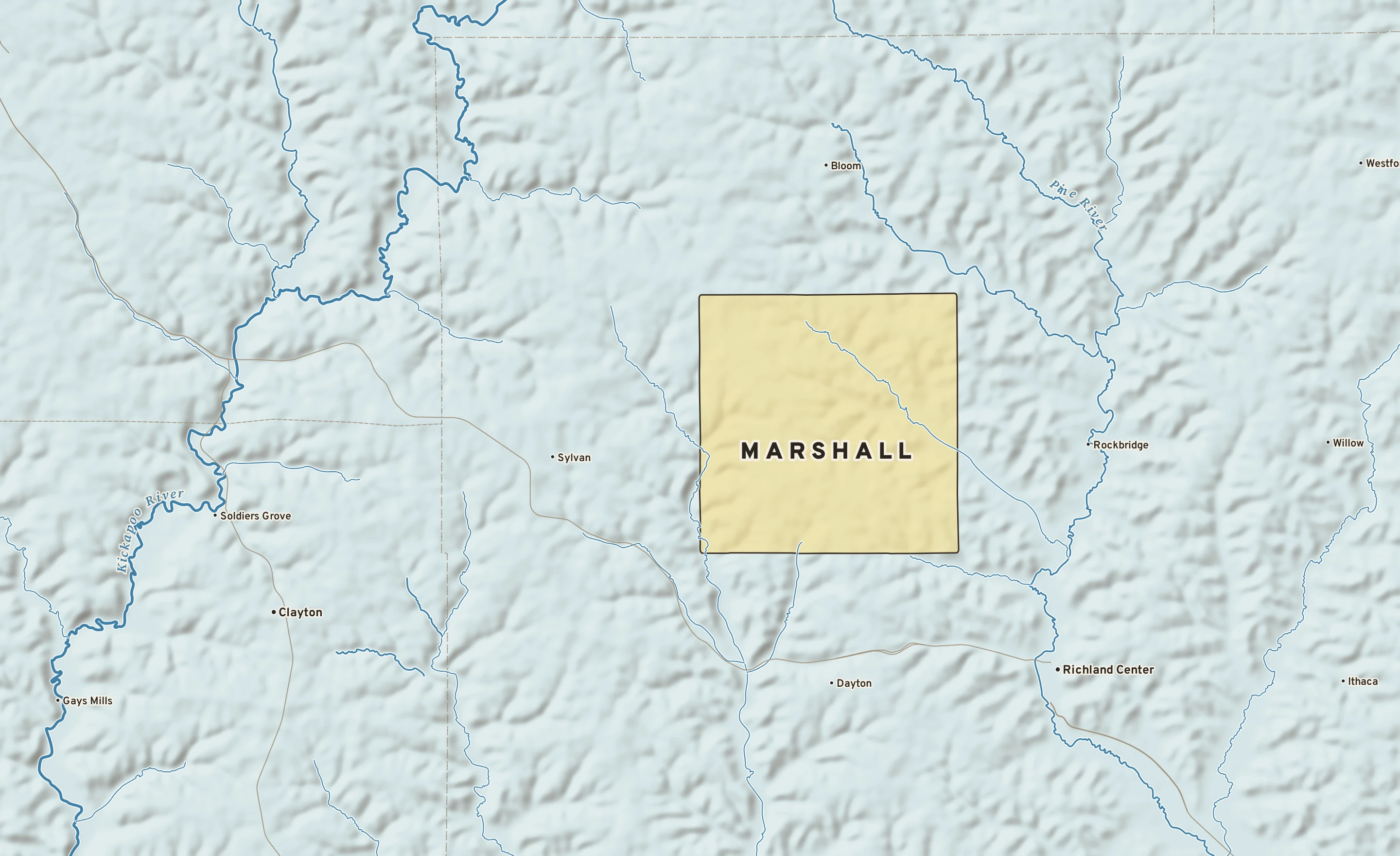 Shaded-relief atlas plate of Marshall, Wisconsin: rivers, roads, the city limits and where the water drains.