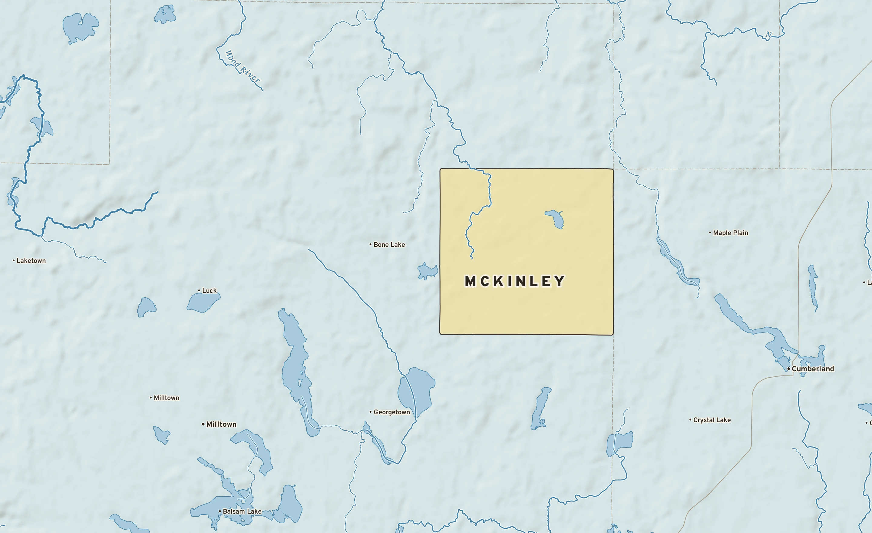 Shaded-relief atlas plate of McKinley, Wisconsin: rivers, roads, the city limits and where the water drains.