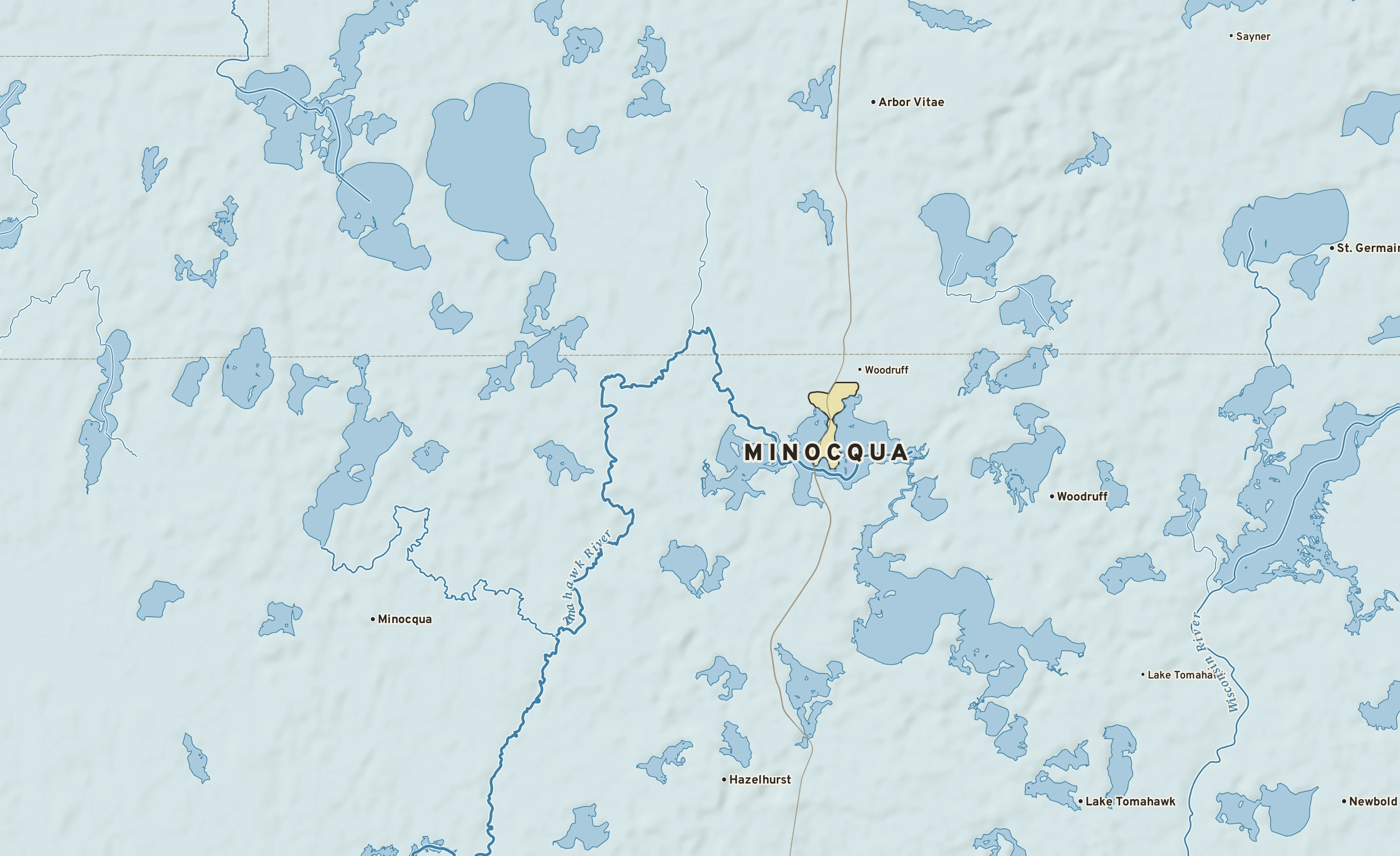 Shaded-relief atlas plate of Minocqua, Wisconsin: rivers, roads, the city limits and where the water drains.
