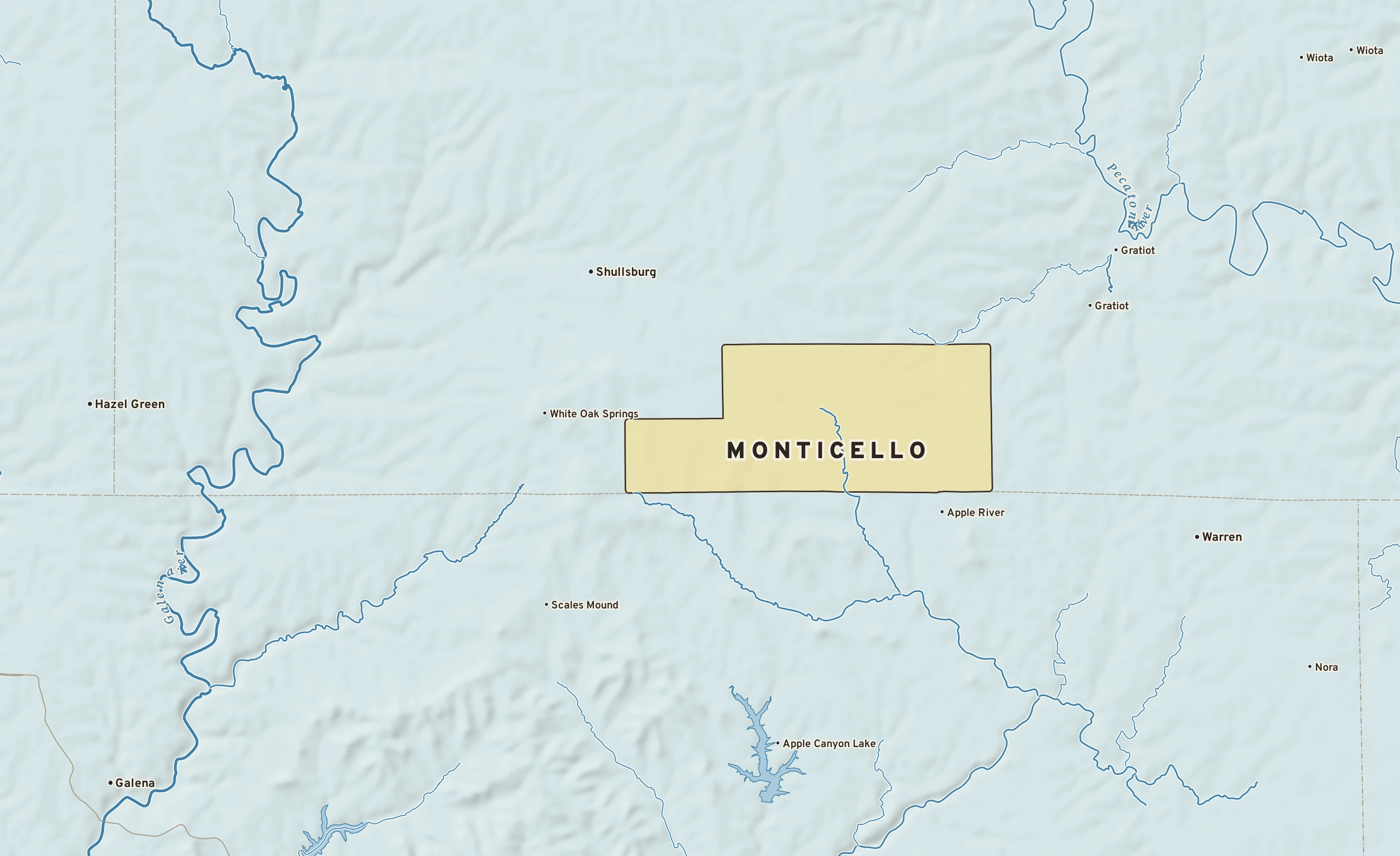 Shaded-relief atlas plate of Monticello, Wisconsin: rivers, roads, the city limits and where the water drains.