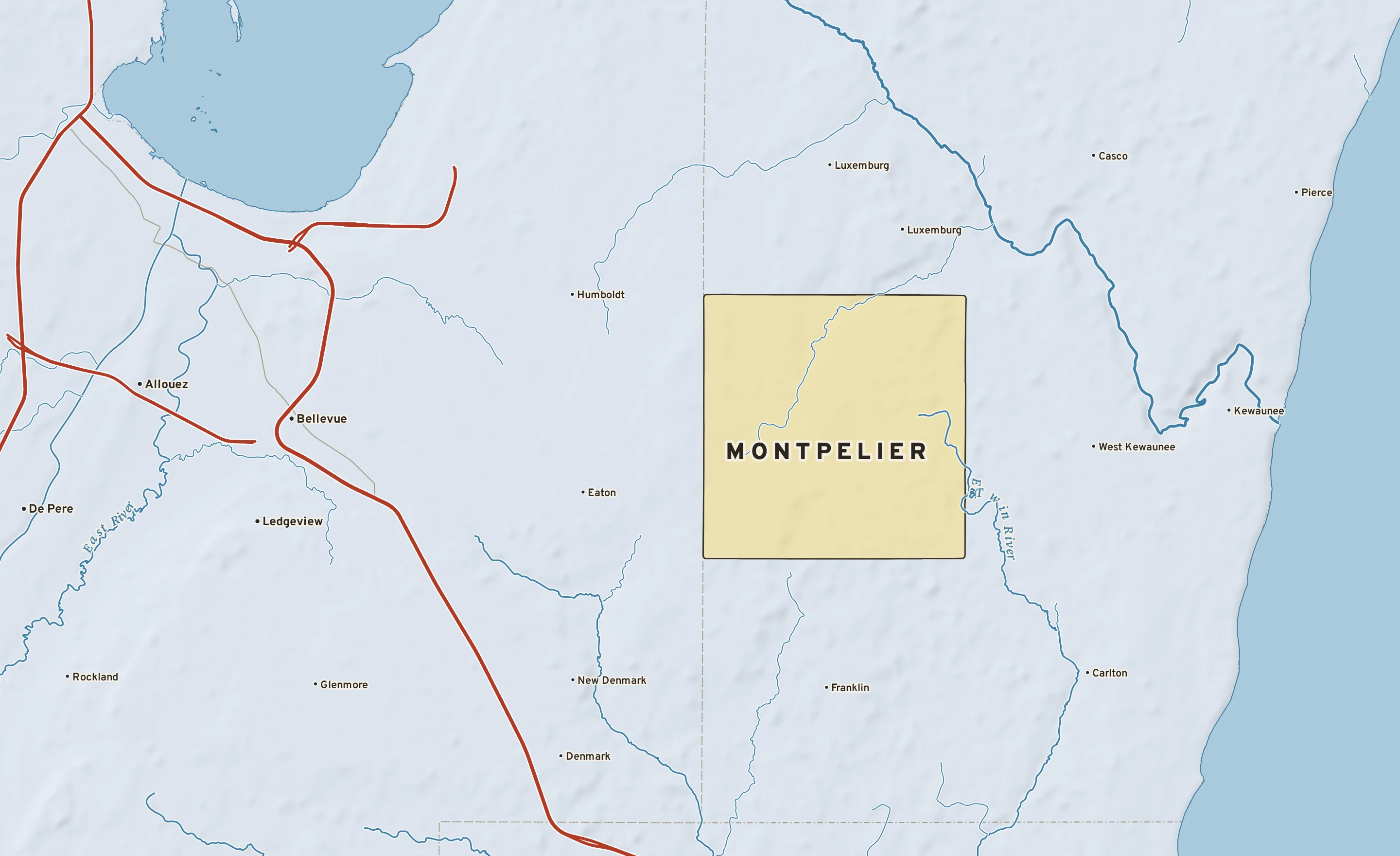 Shaded-relief atlas plate of Montpelier, Wisconsin: rivers, roads, the city limits and where the water drains.