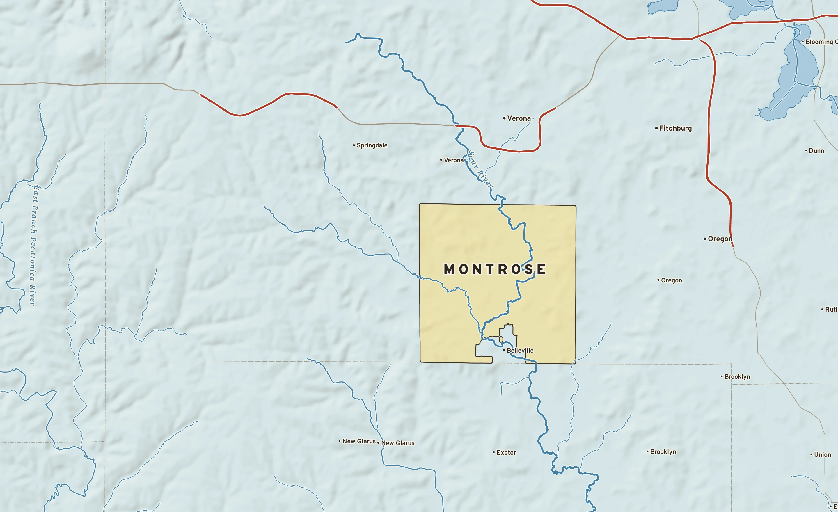 Shaded-relief atlas plate of Montrose, Wisconsin: rivers, roads, the city limits and where the water drains.