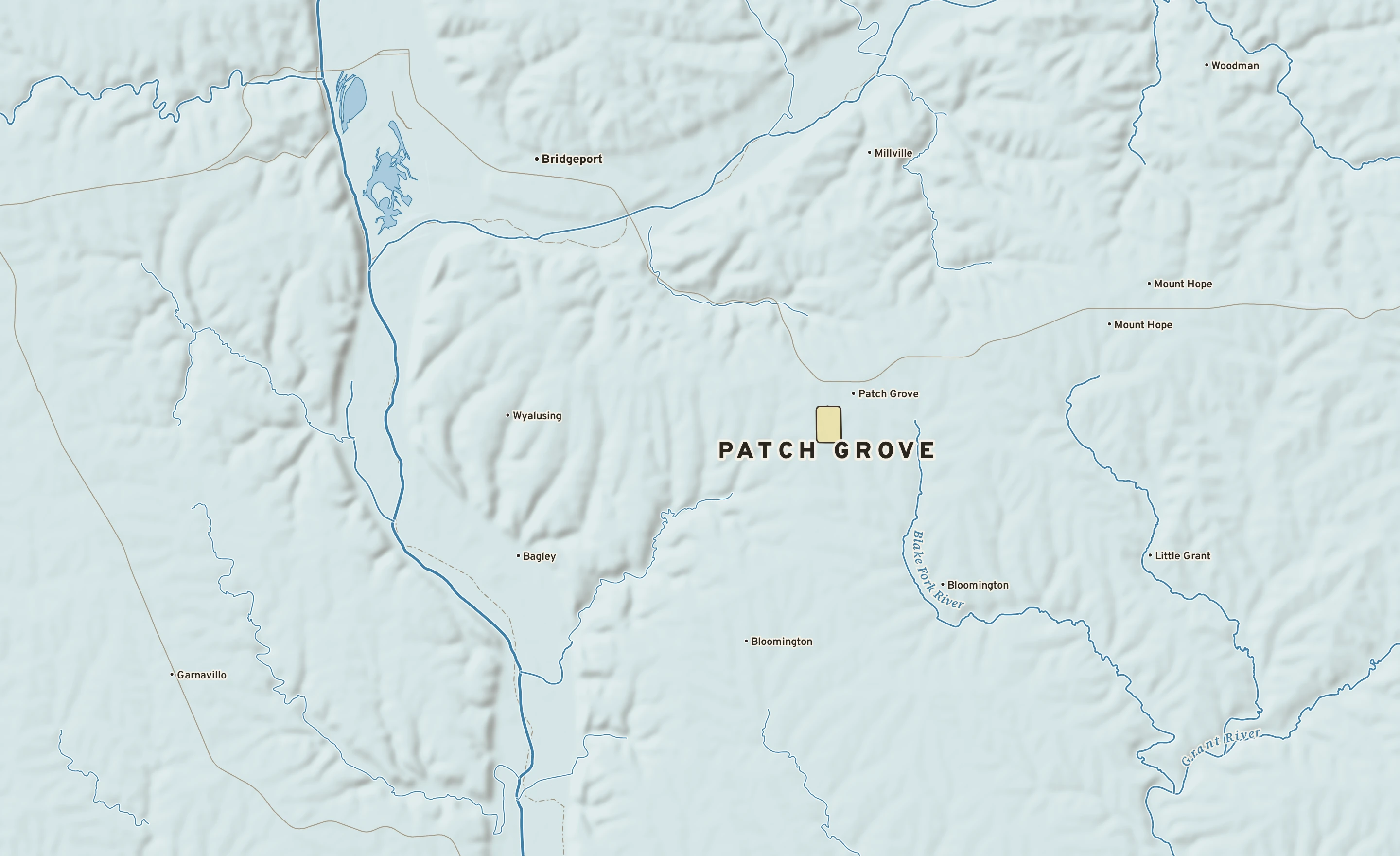 Shaded-relief atlas plate of Patch Grove, Wisconsin: rivers, roads, the city limits and where the water drains.