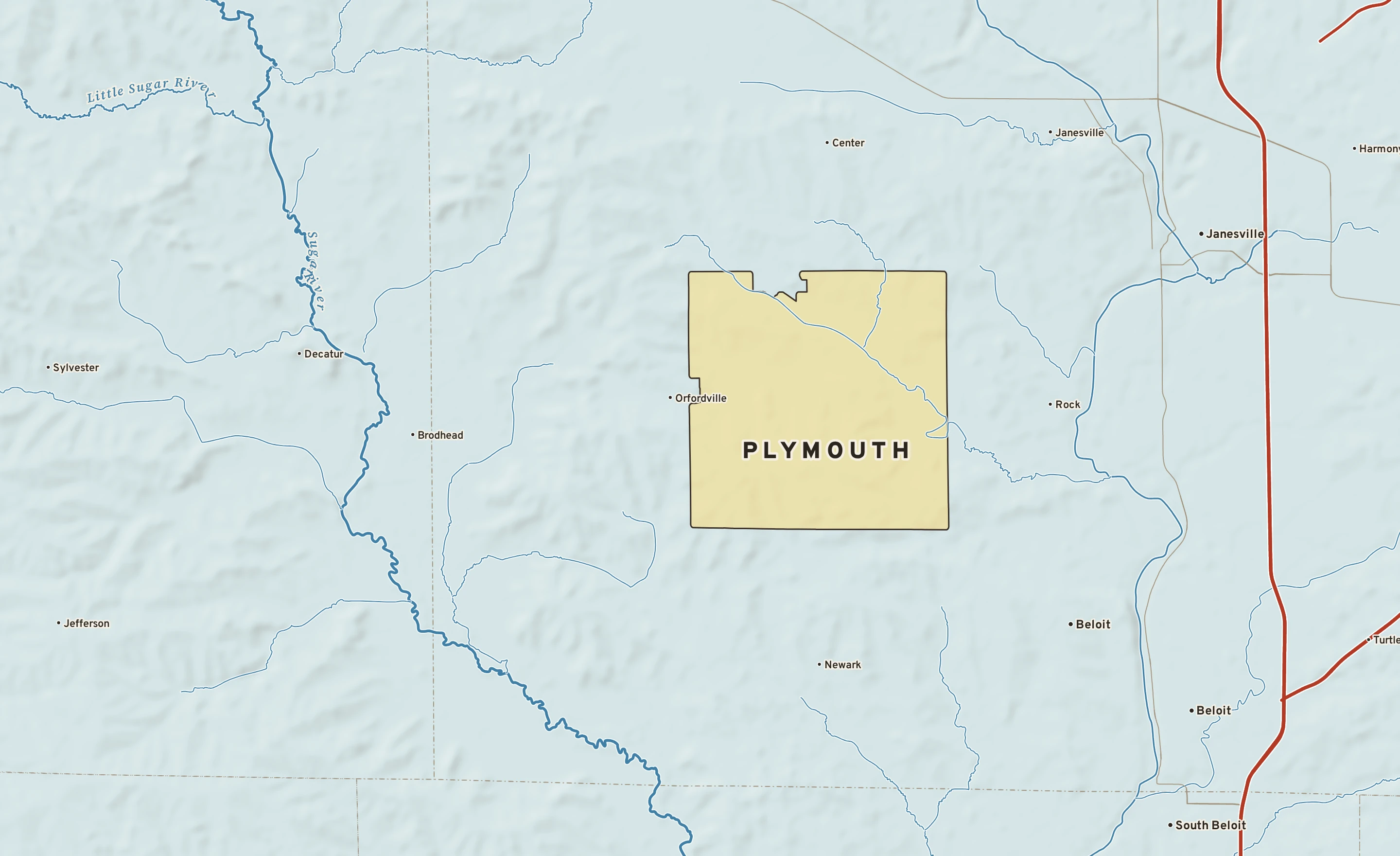 Shaded-relief atlas plate of Plymouth, Wisconsin: rivers, roads, the city limits and where the water drains.