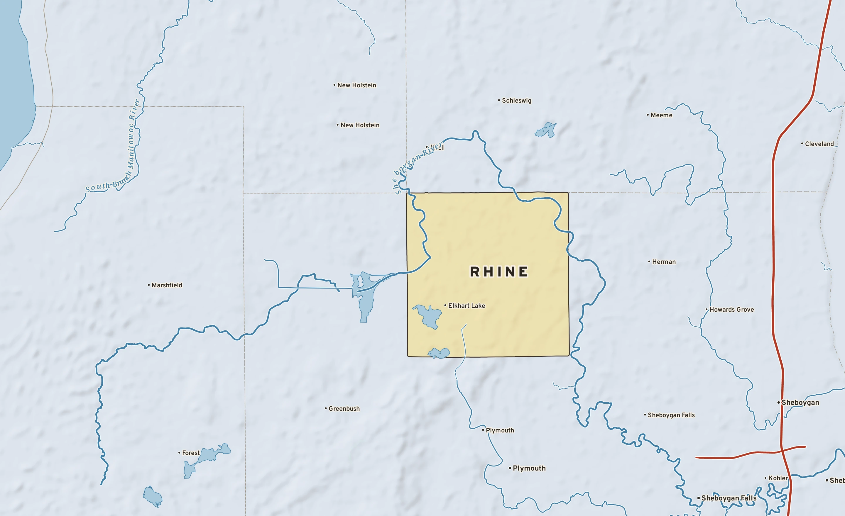 Shaded-relief atlas plate of Rhine, Wisconsin: rivers, roads, the city limits and where the water drains.