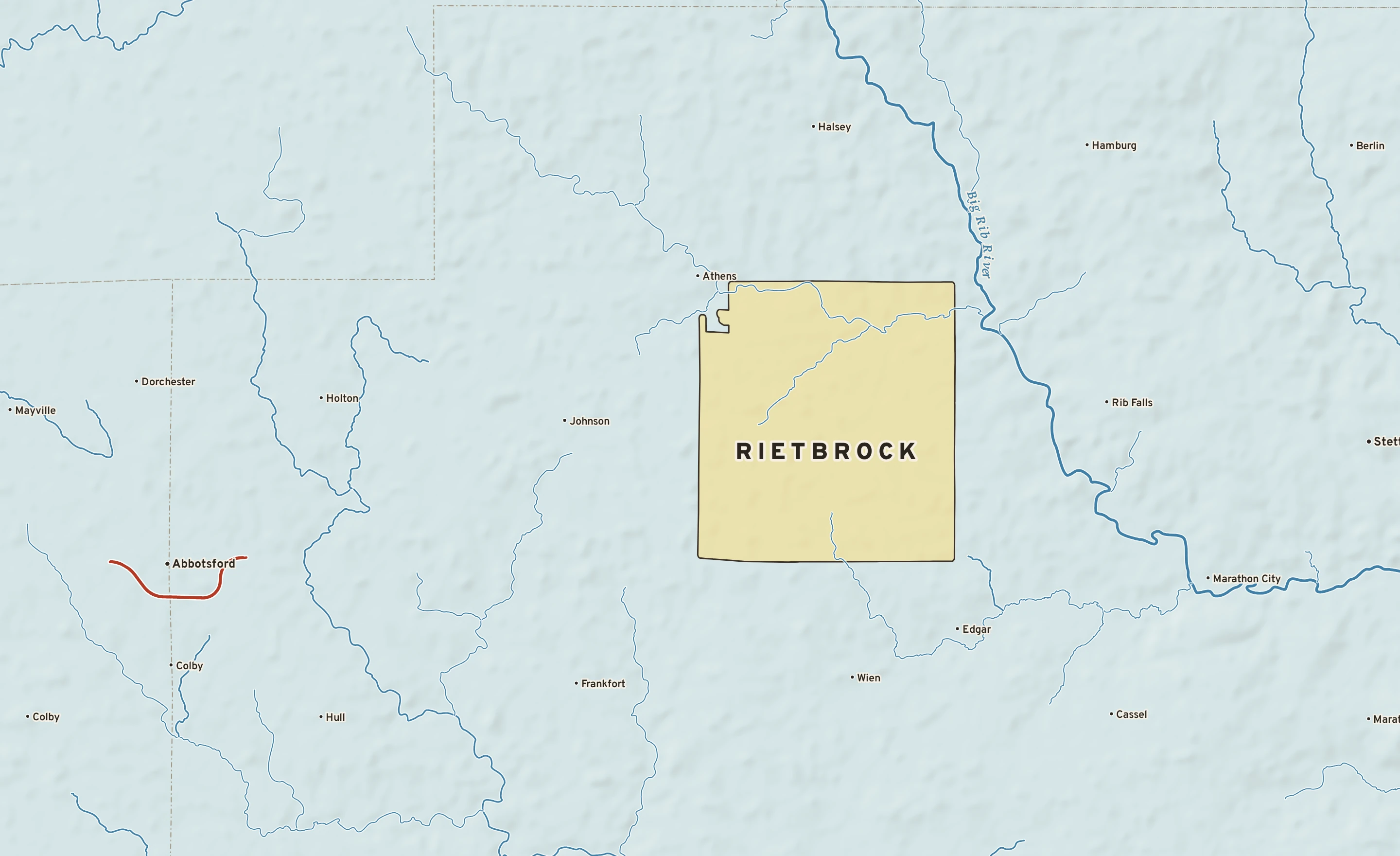 Shaded-relief atlas plate of Rietbrock, Wisconsin: rivers, roads, the city limits and where the water drains.