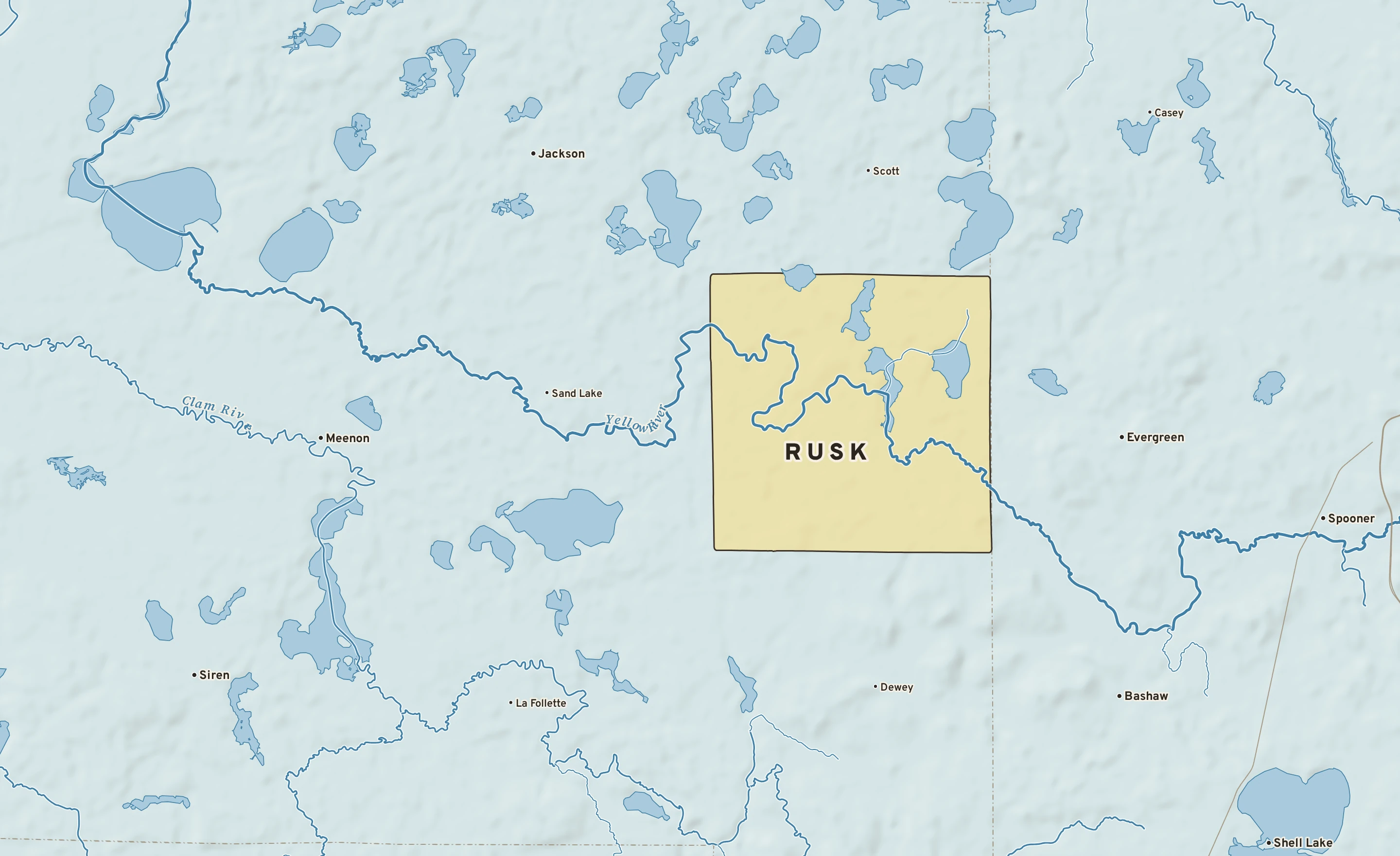 Shaded-relief atlas plate of Rusk, Wisconsin: rivers, roads, the city limits and where the water drains.