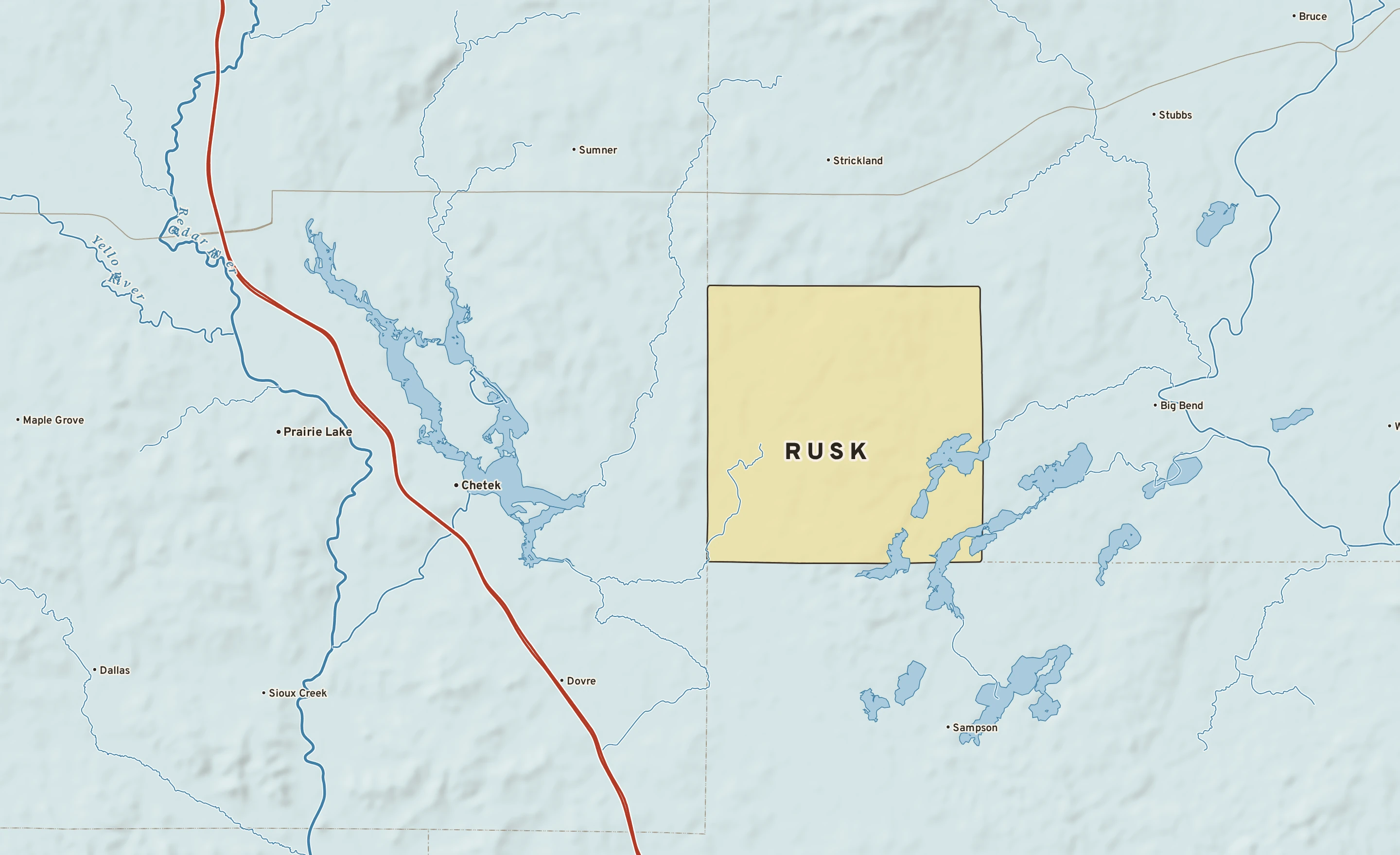 Shaded-relief atlas plate of Rusk, Wisconsin: rivers, roads, the city limits and where the water drains.