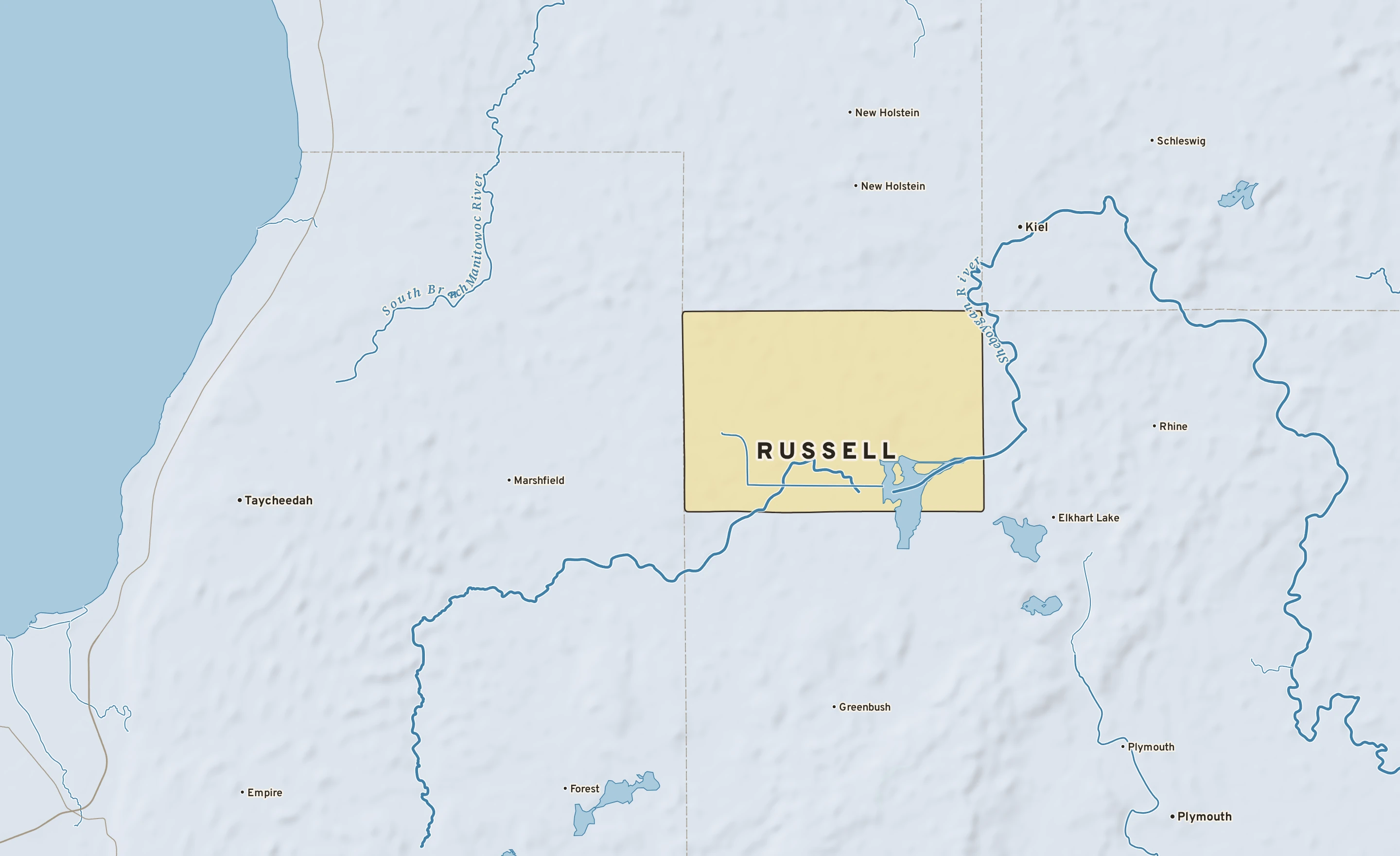 Shaded-relief atlas plate of Russell, Wisconsin: rivers, roads, the city limits and where the water drains.