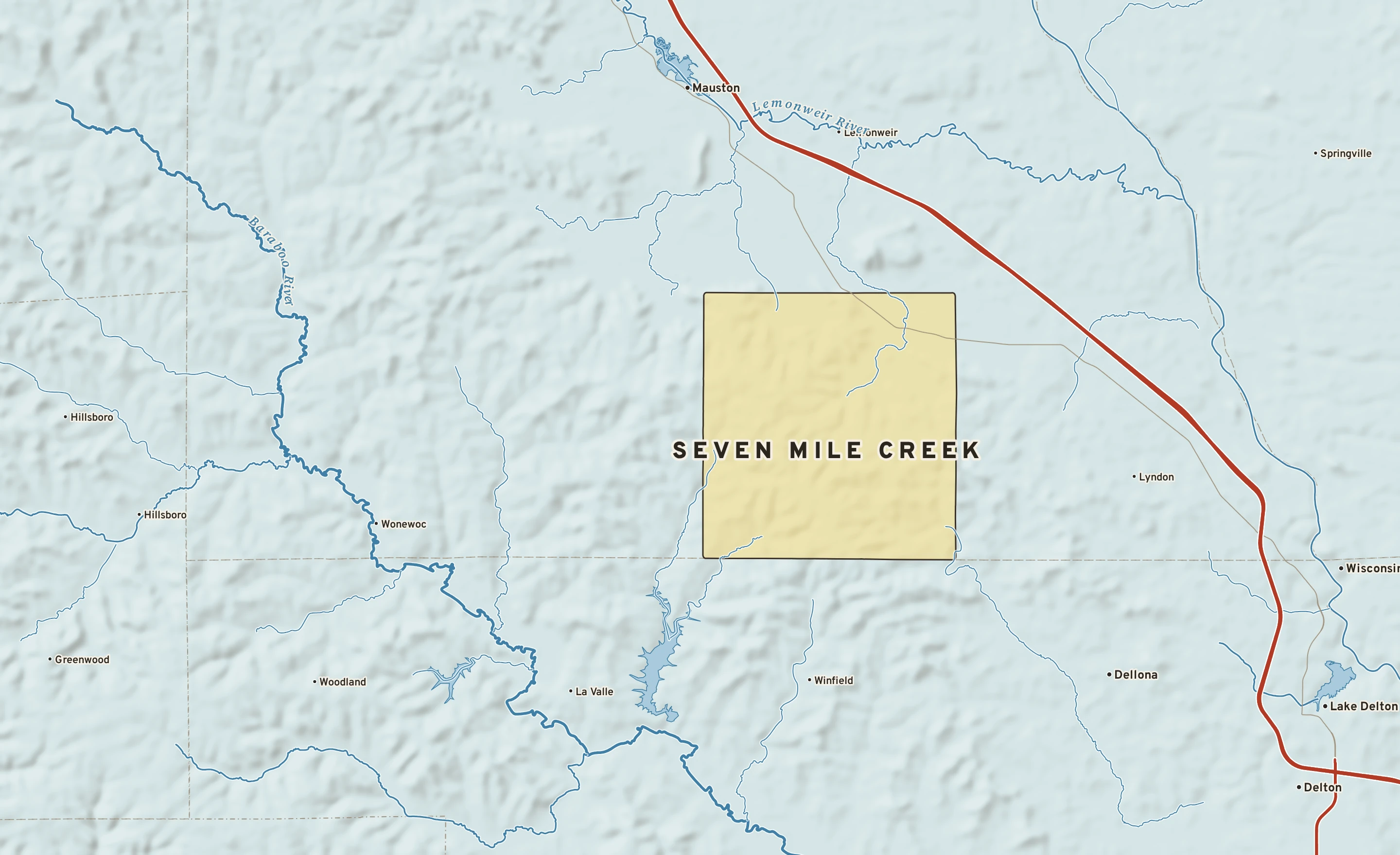 Shaded-relief atlas plate of Seven Mile Creek, Wisconsin: rivers, roads, the city limits and where the water drains.