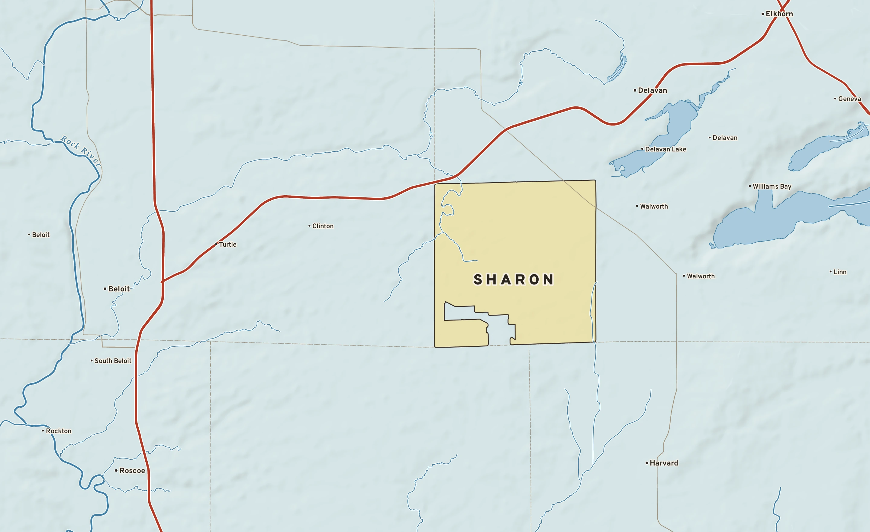 Shaded-relief atlas plate of Sharon, Wisconsin: rivers, roads, the city limits and where the water drains.