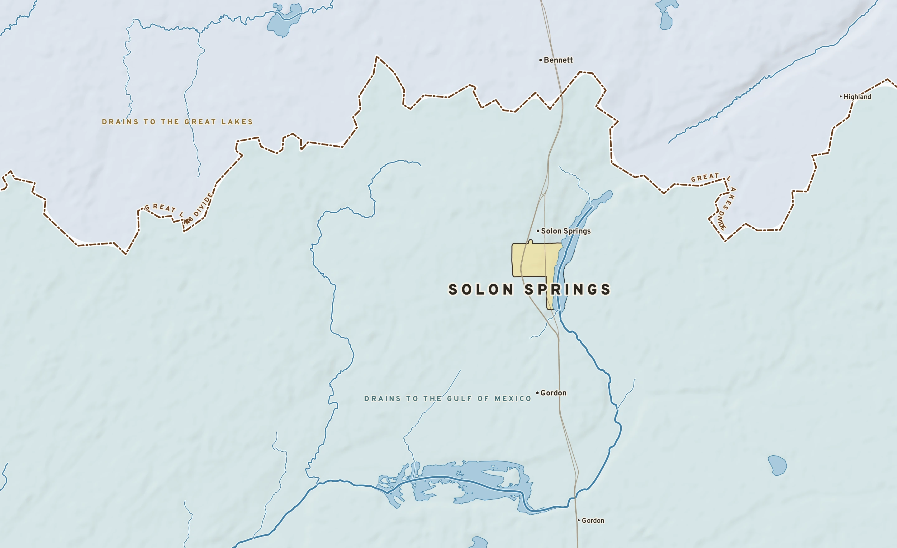Shaded-relief atlas plate of Solon Springs, Wisconsin: rivers, roads, the city limits and where the water drains.