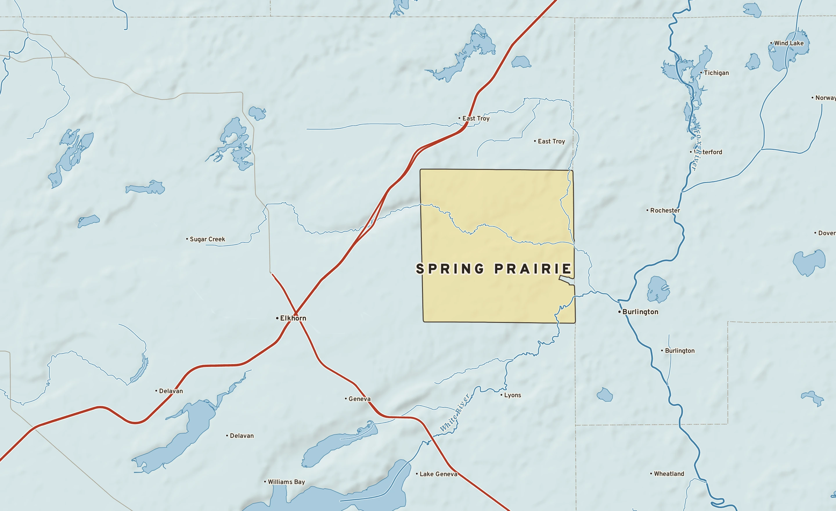 Shaded-relief atlas plate of Spring Prairie, Wisconsin: rivers, roads, the city limits and where the water drains.