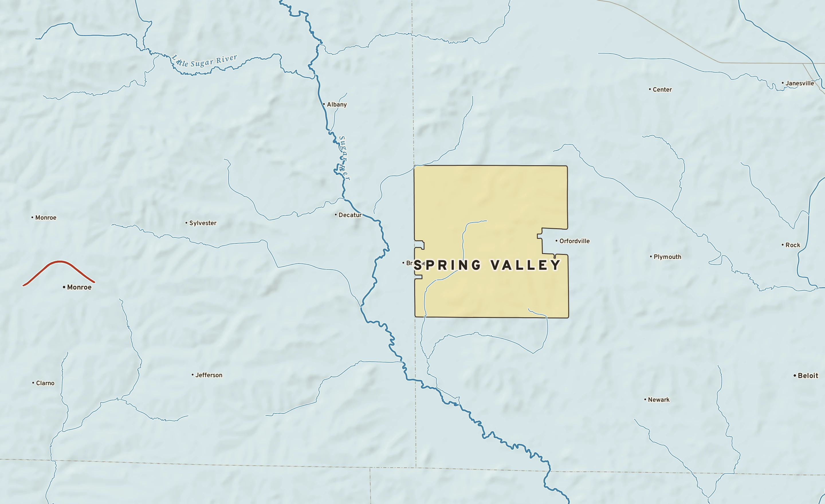 Shaded-relief atlas plate of Spring Valley, Wisconsin: rivers, roads, the city limits and where the water drains.