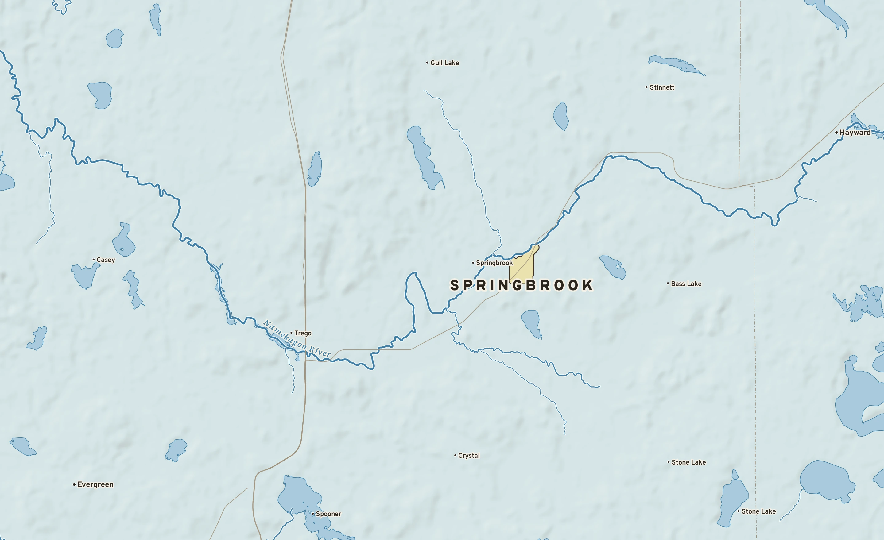 Shaded-relief atlas plate of Springbrook, Wisconsin: rivers, roads, the city limits and where the water drains.