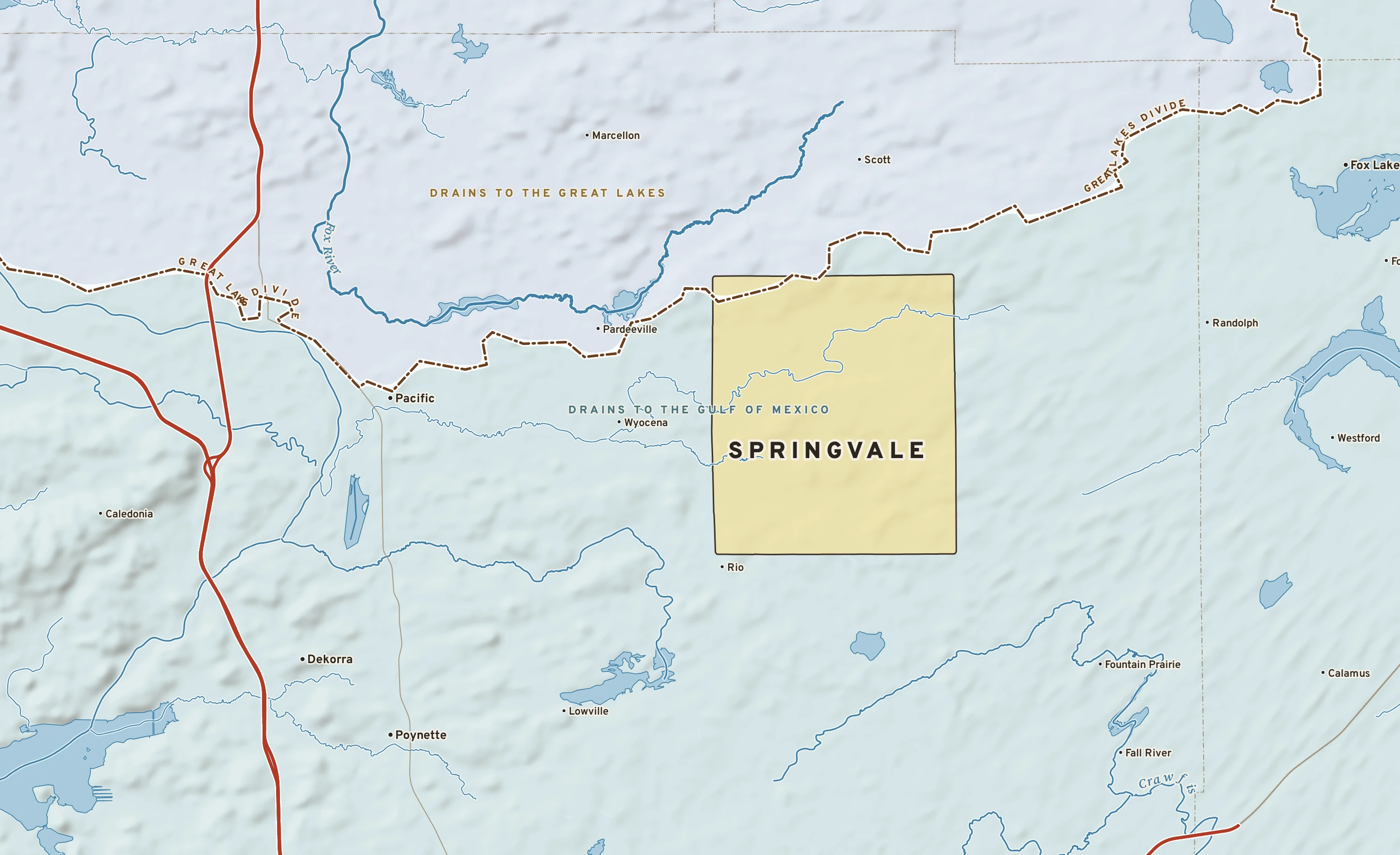 Shaded-relief atlas plate of Springvale, Wisconsin: rivers, roads, the city limits and where the water drains.
