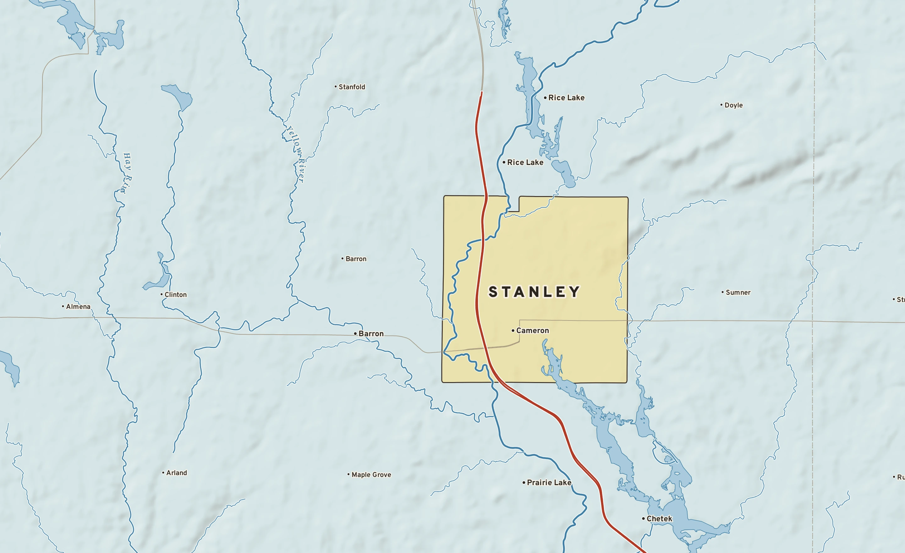 Shaded-relief atlas plate of Stanley, Wisconsin: rivers, roads, the city limits and where the water drains.