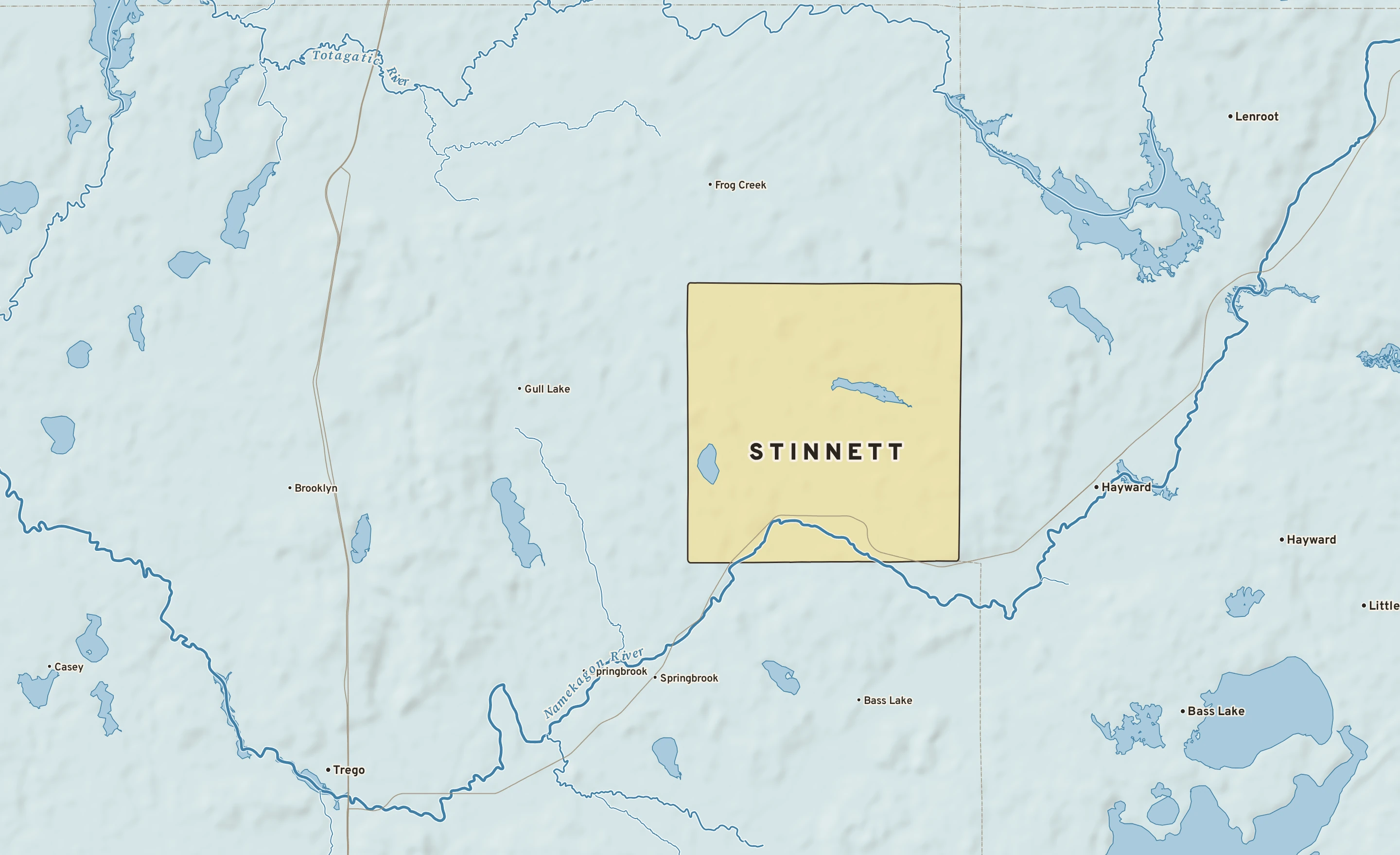Shaded-relief atlas plate of Stinnett, Wisconsin: rivers, roads, the city limits and where the water drains.
