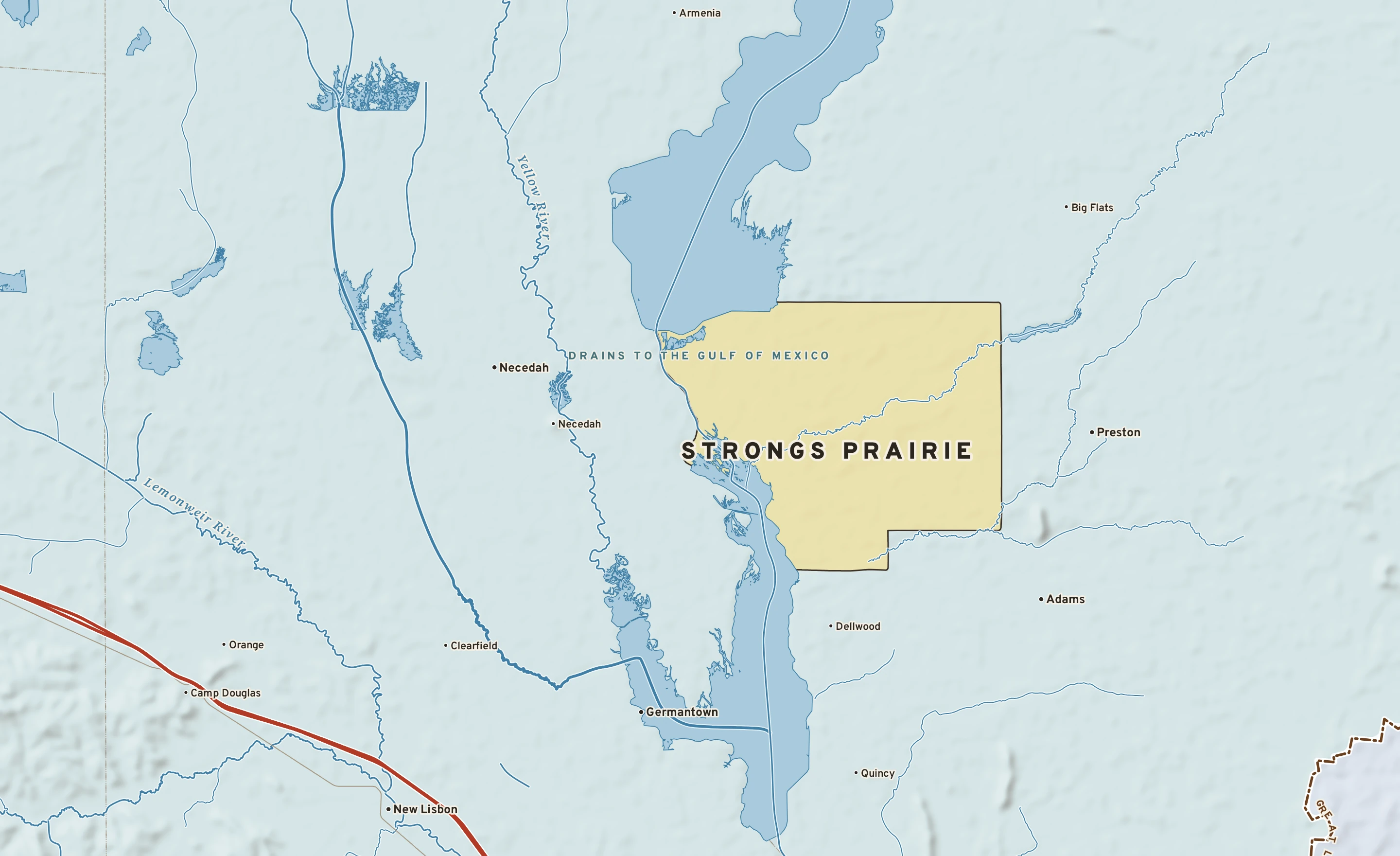 Shaded-relief atlas plate of Strongs Prairie, Wisconsin: rivers, roads, the city limits and where the water drains.