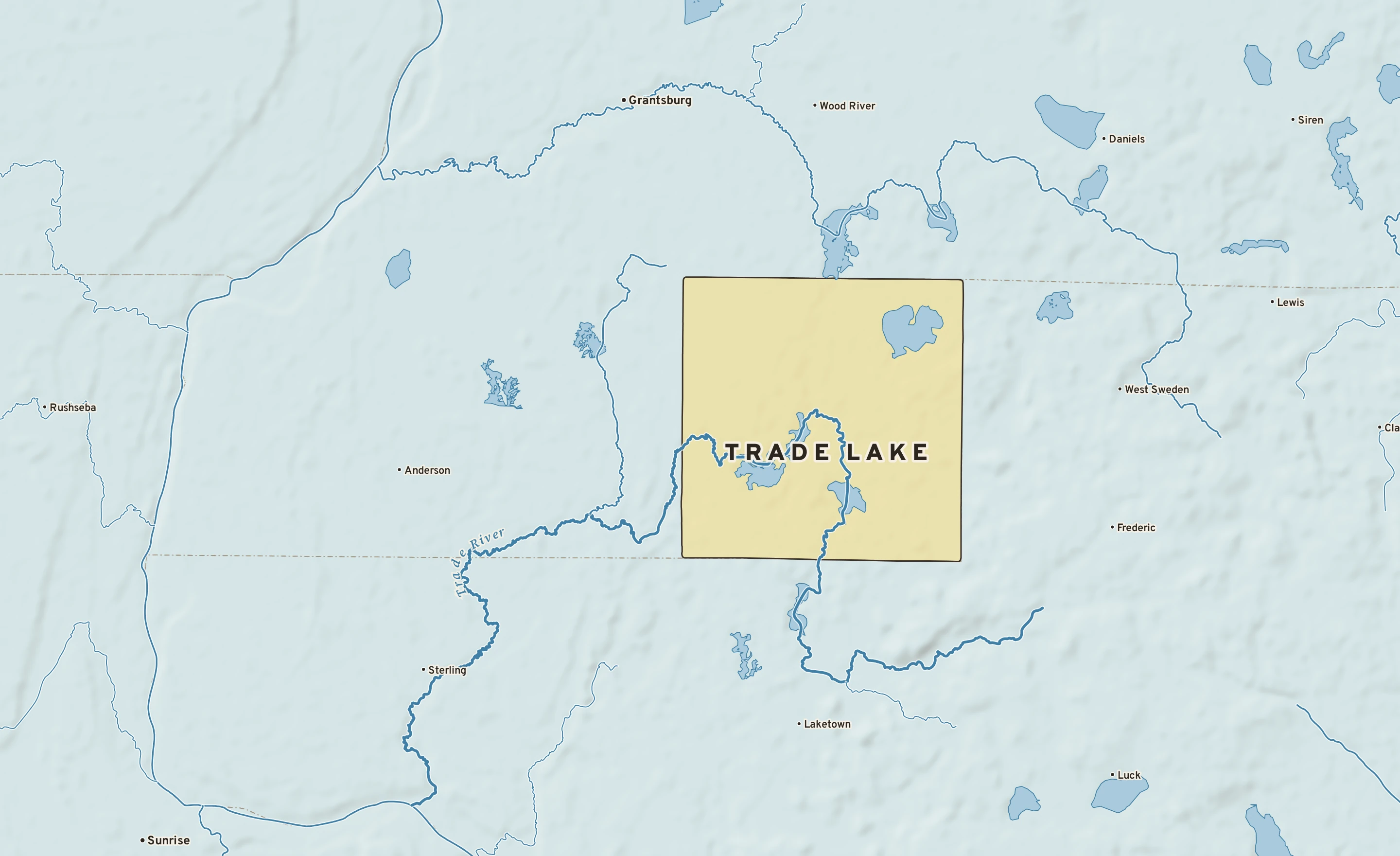 Shaded-relief atlas plate of Trade Lake, Wisconsin: rivers, roads, the city limits and where the water drains.
