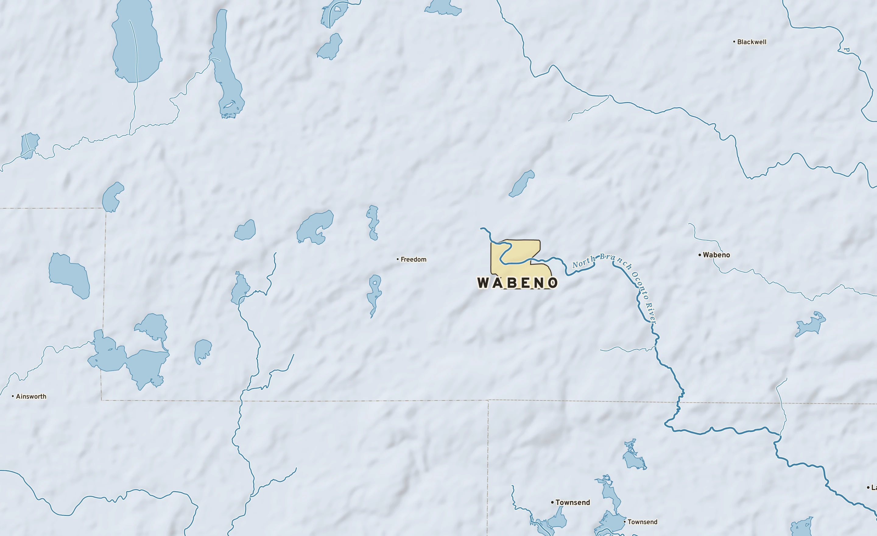 Shaded-relief atlas plate of Wabeno, Wisconsin: rivers, roads, the city limits and where the water drains.