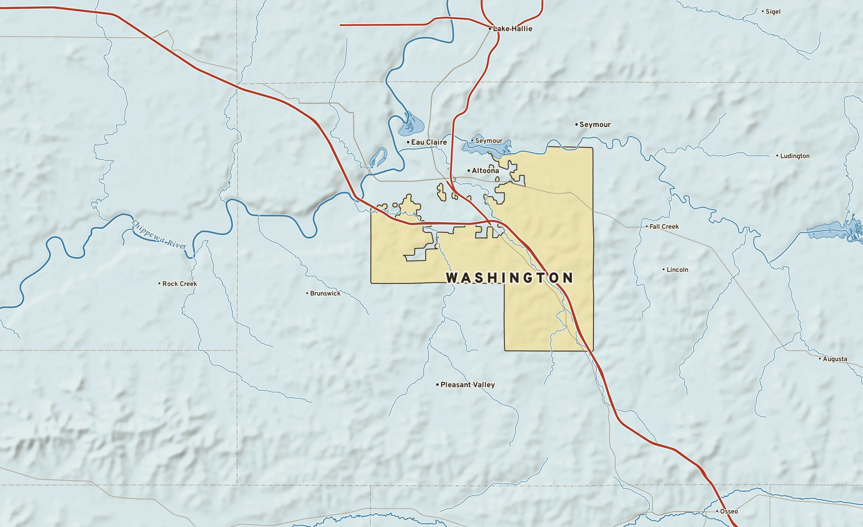 Shaded-relief atlas plate of Washington, Wisconsin: rivers, roads, the city limits and where the water drains.