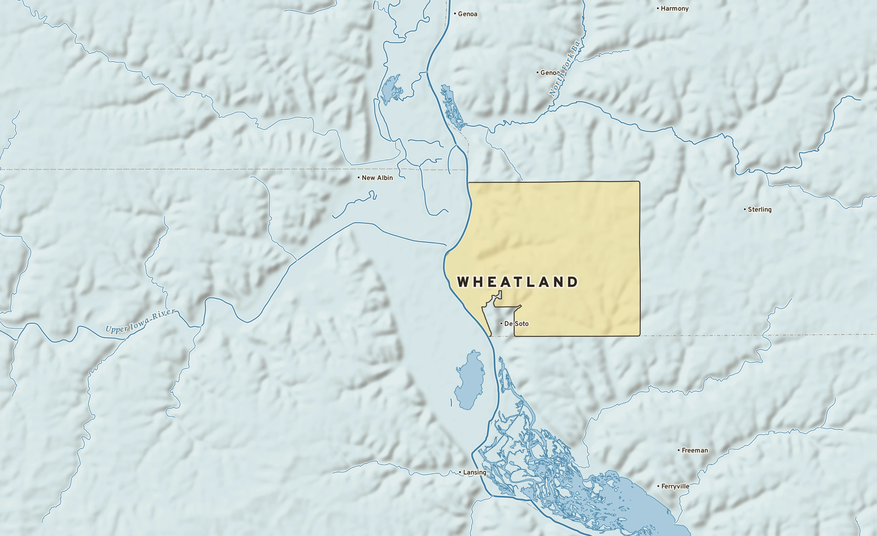 Shaded-relief atlas plate of Wheatland, Wisconsin: rivers, roads, the city limits and where the water drains.