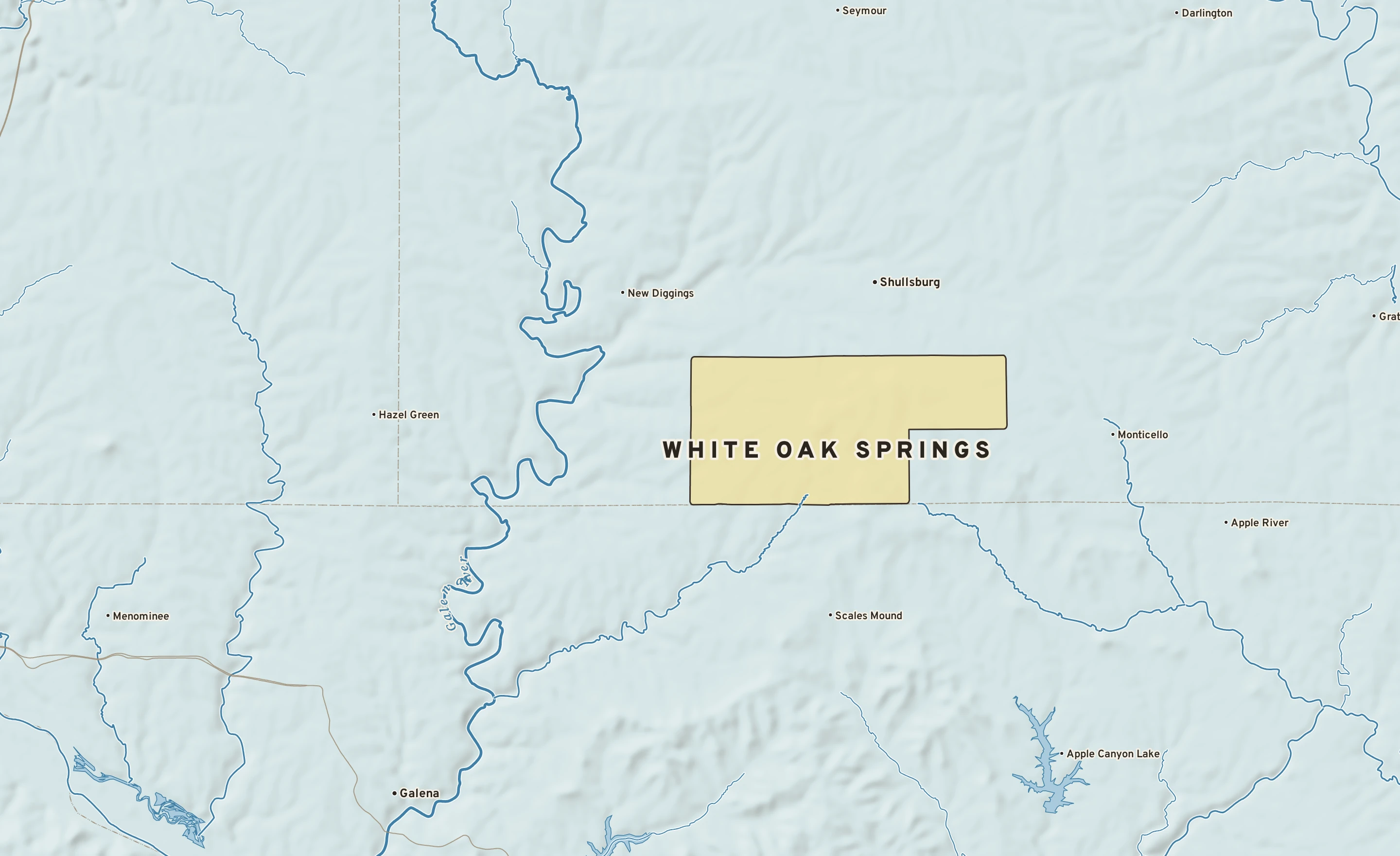 Shaded-relief atlas plate of White Oak Springs, Wisconsin: rivers, roads, the city limits and where the water drains.