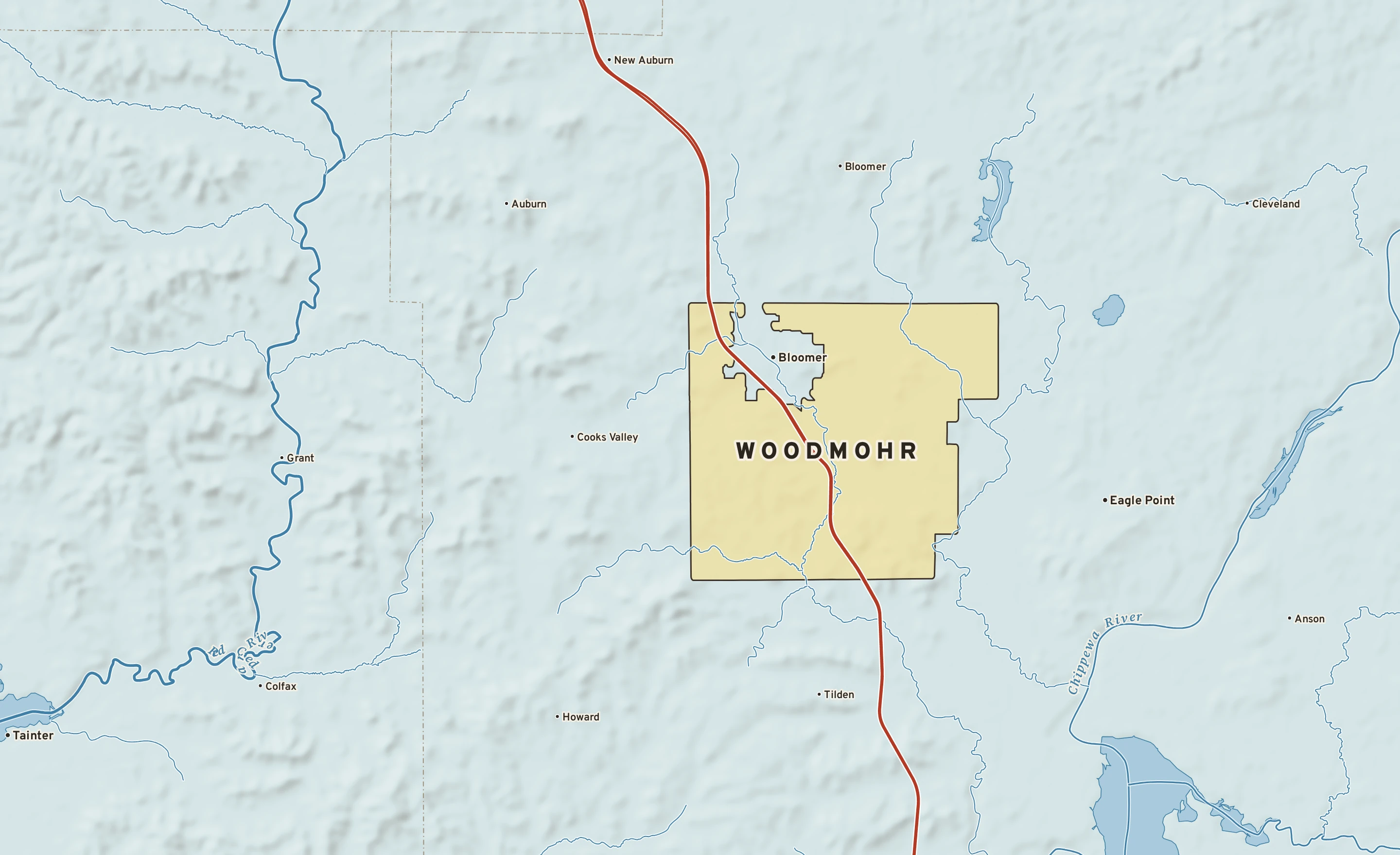 Shaded-relief atlas plate of Woodmohr, Wisconsin: rivers, roads, the city limits and where the water drains.