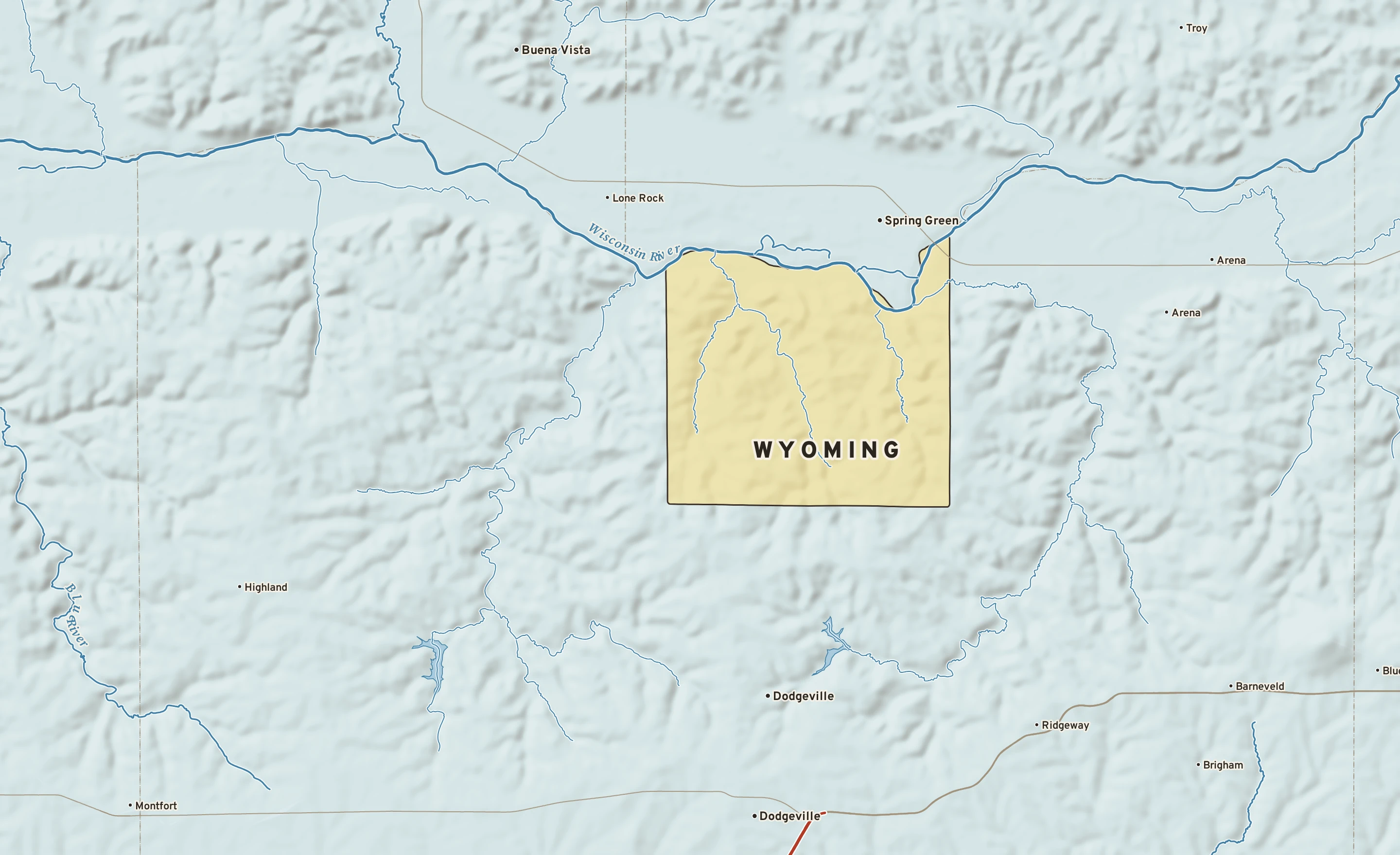 Shaded-relief atlas plate of Wyoming, Wisconsin: rivers, roads, the city limits and where the water drains.